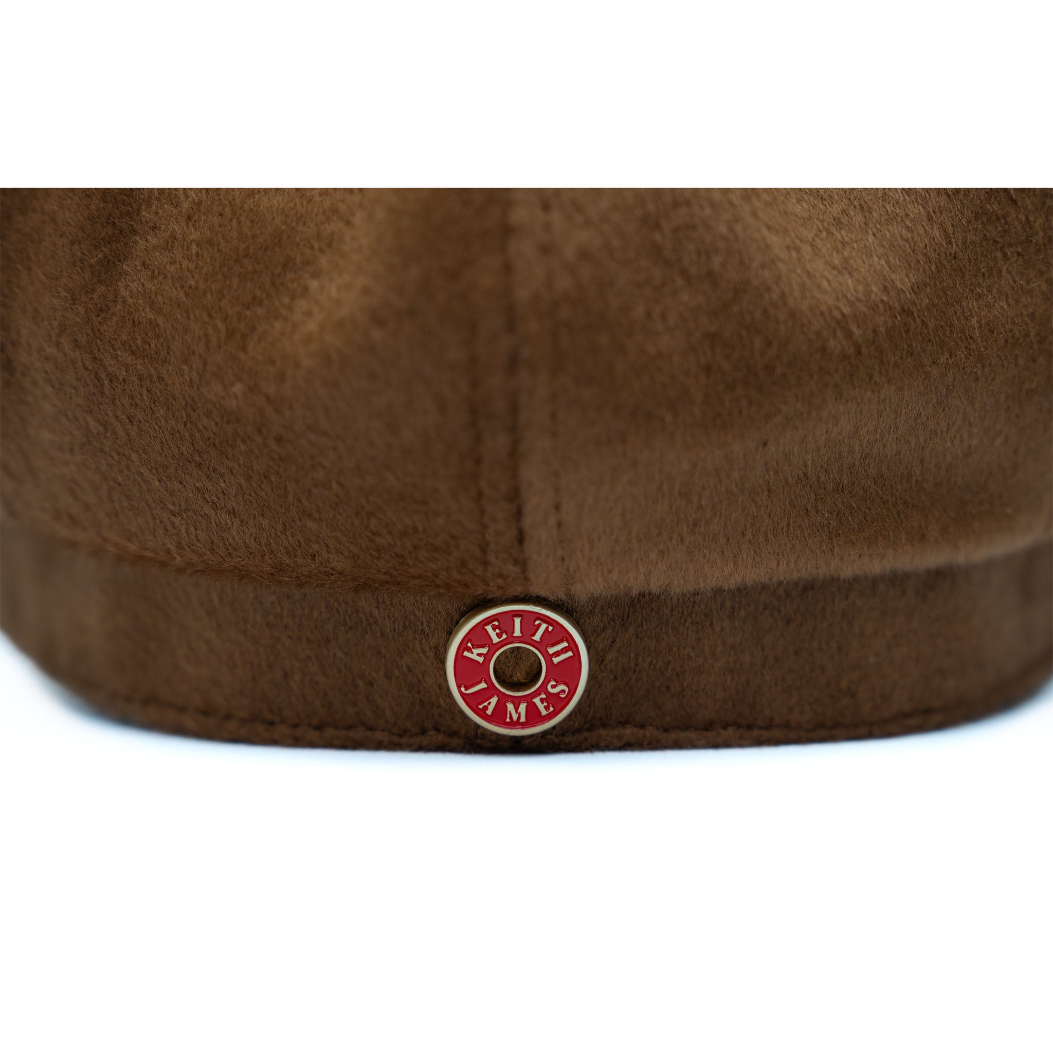 A cocoa brown colored cap made of wool with a flat visor and no visible brand marking.