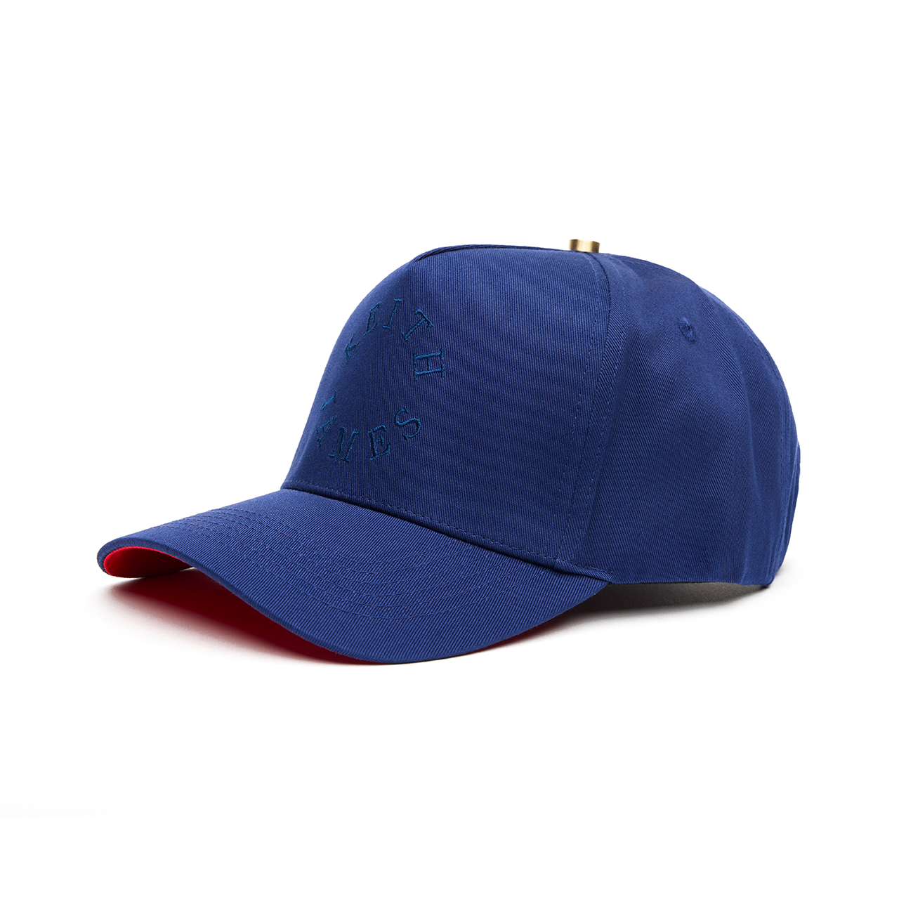 A navy blue 5 panel baseball cap with an adjustable band and a logo embroidered on the front with a red bottom brim.