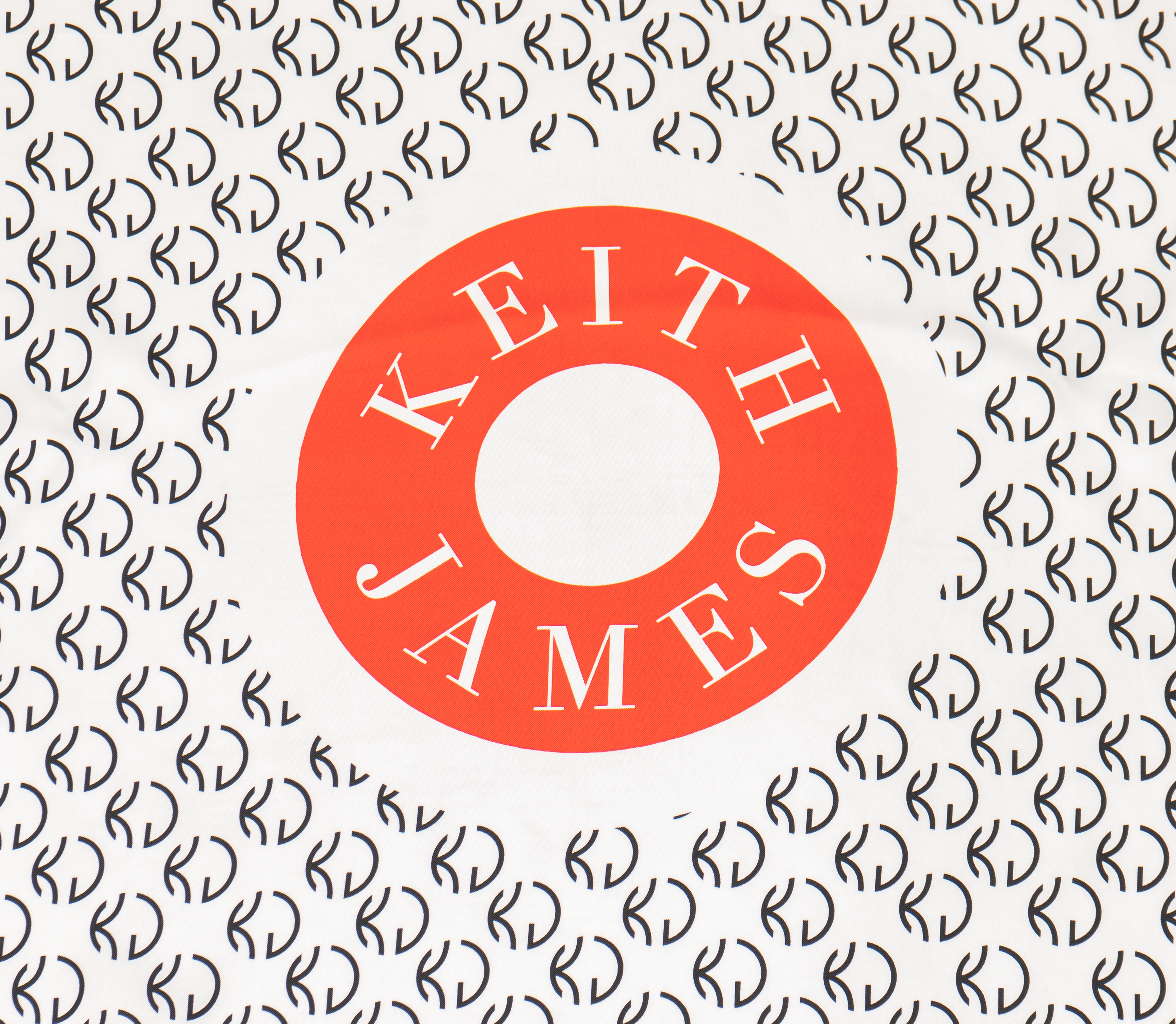 Red circular logo with 'Keith James' text on a white background with black patterns