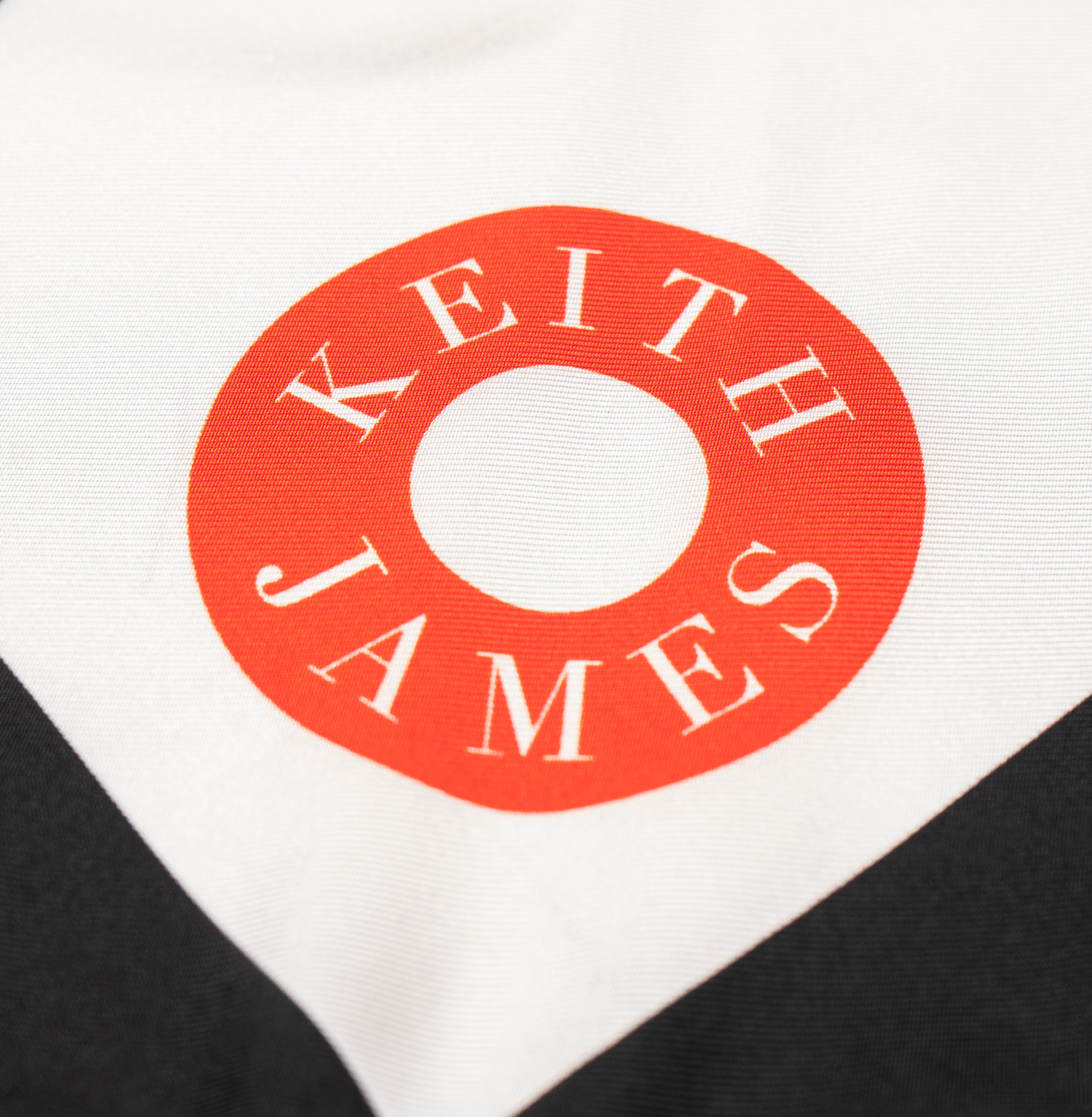 Keith James logo on a white and black background