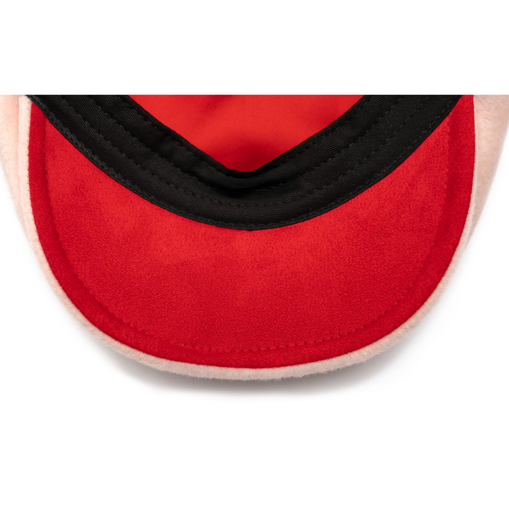 A soft pink newsboy cap with a flat visor, made of Australian wool, featuring a satin lining and gold hardware.