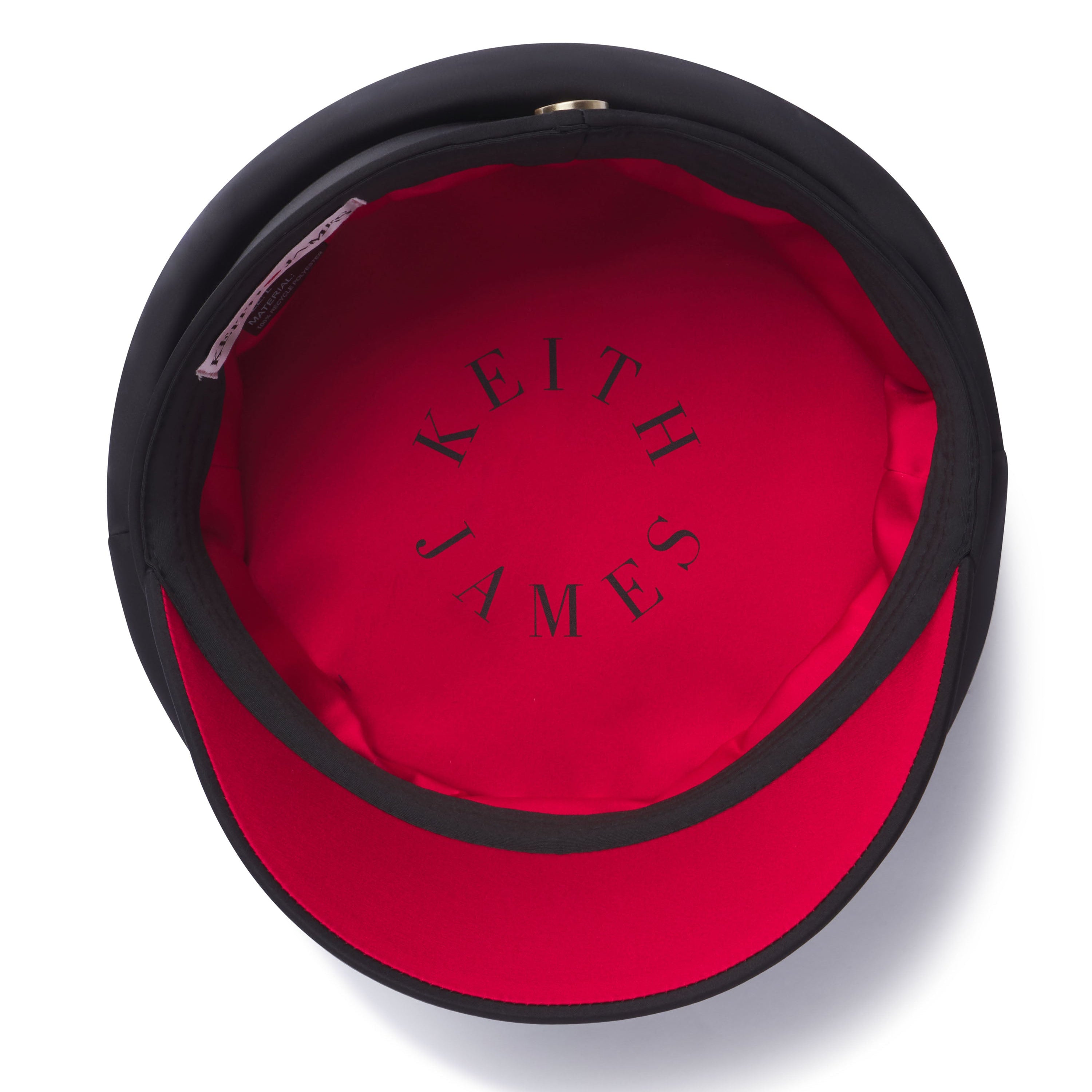 Red interior of a hat with 'Keith James' branding on a white background
