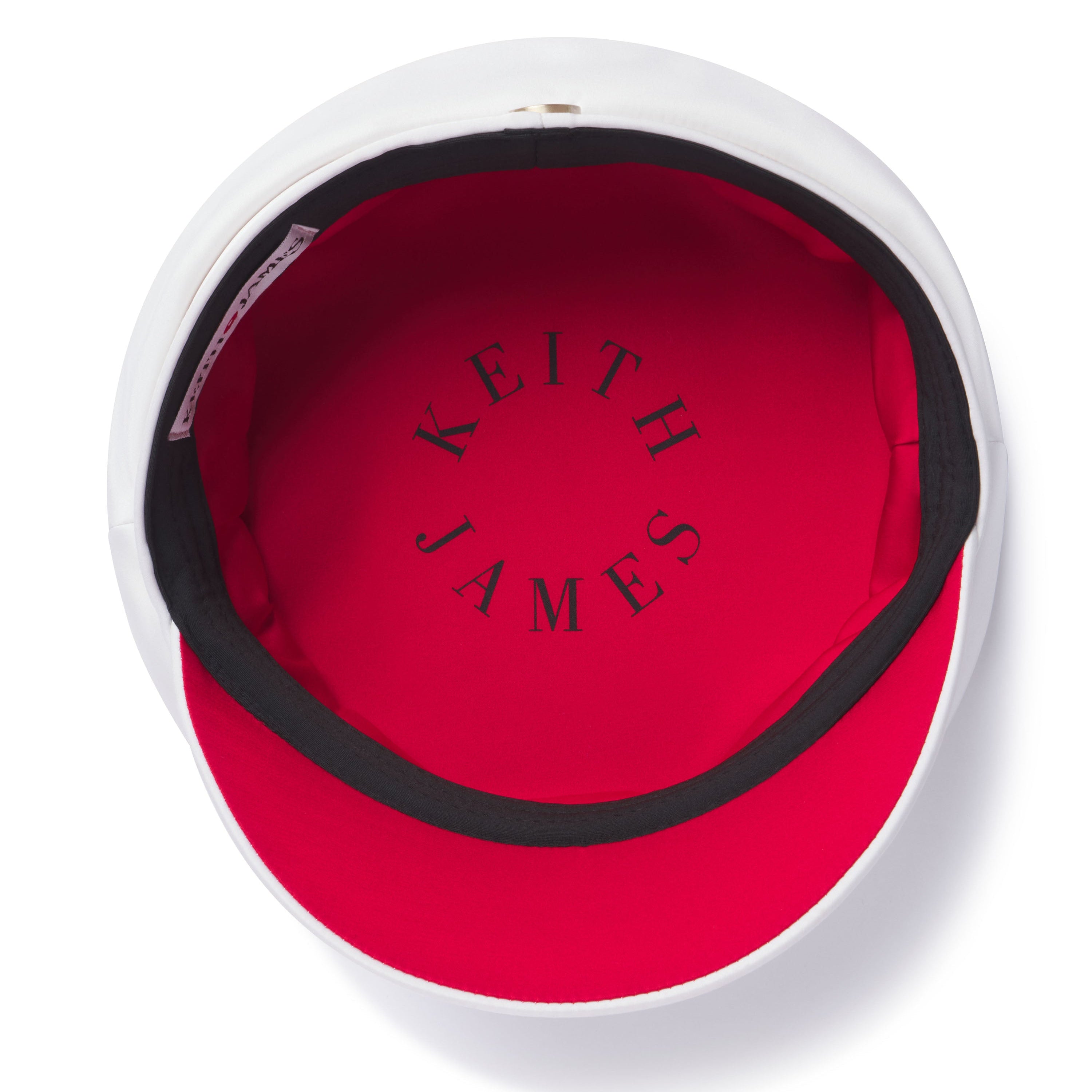 Red interior of a product with 'Keith James' branding on a white background