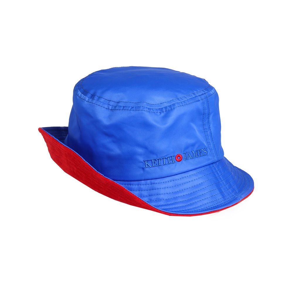 A true blue bucket hat with a red trim and the brand 'Keith James' embroidered on the front.