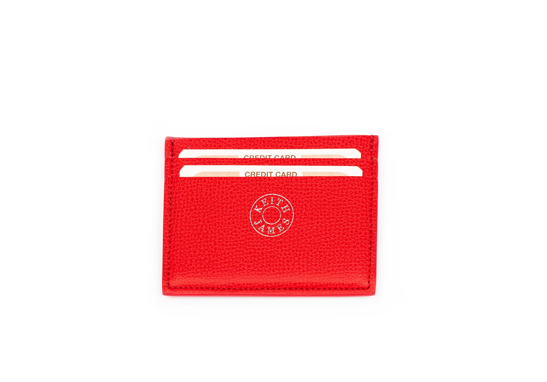 A red leather credit card case with multiple card slots and a logo stamp on the front.