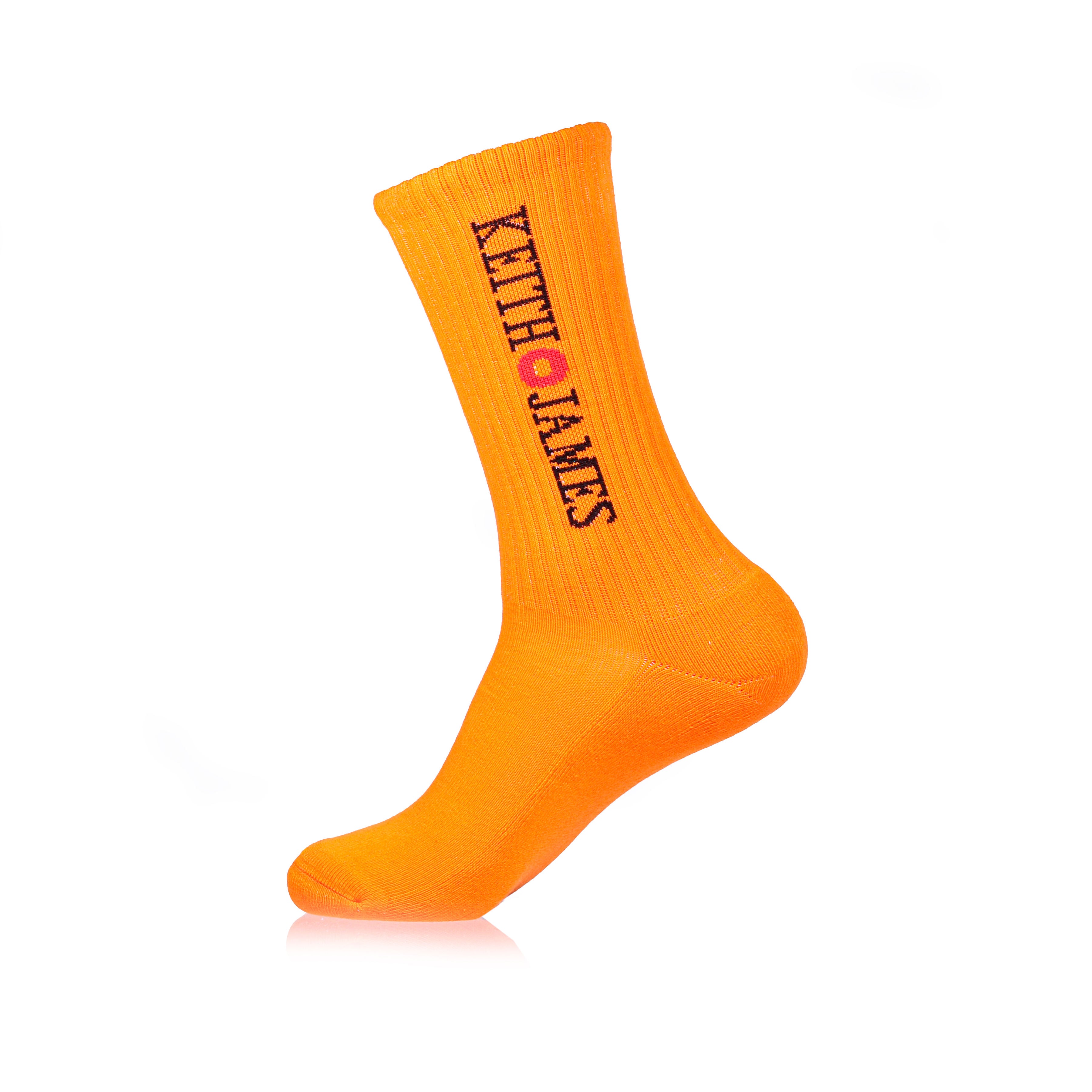 A single orange sock with the text 'KEITH JAMES' printed in a darker shade vertically along the side.