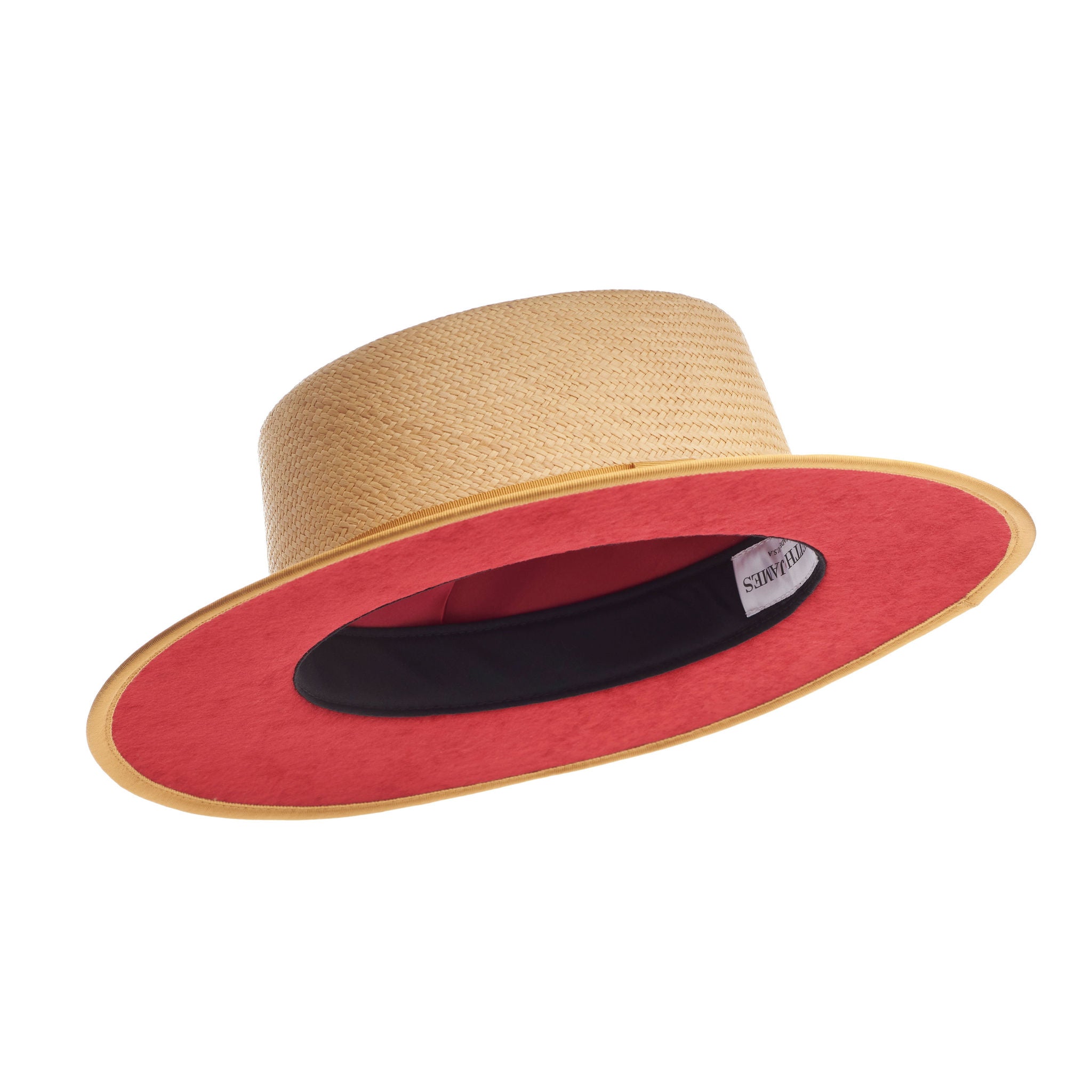 Beige straw hat with a brown band on a white background