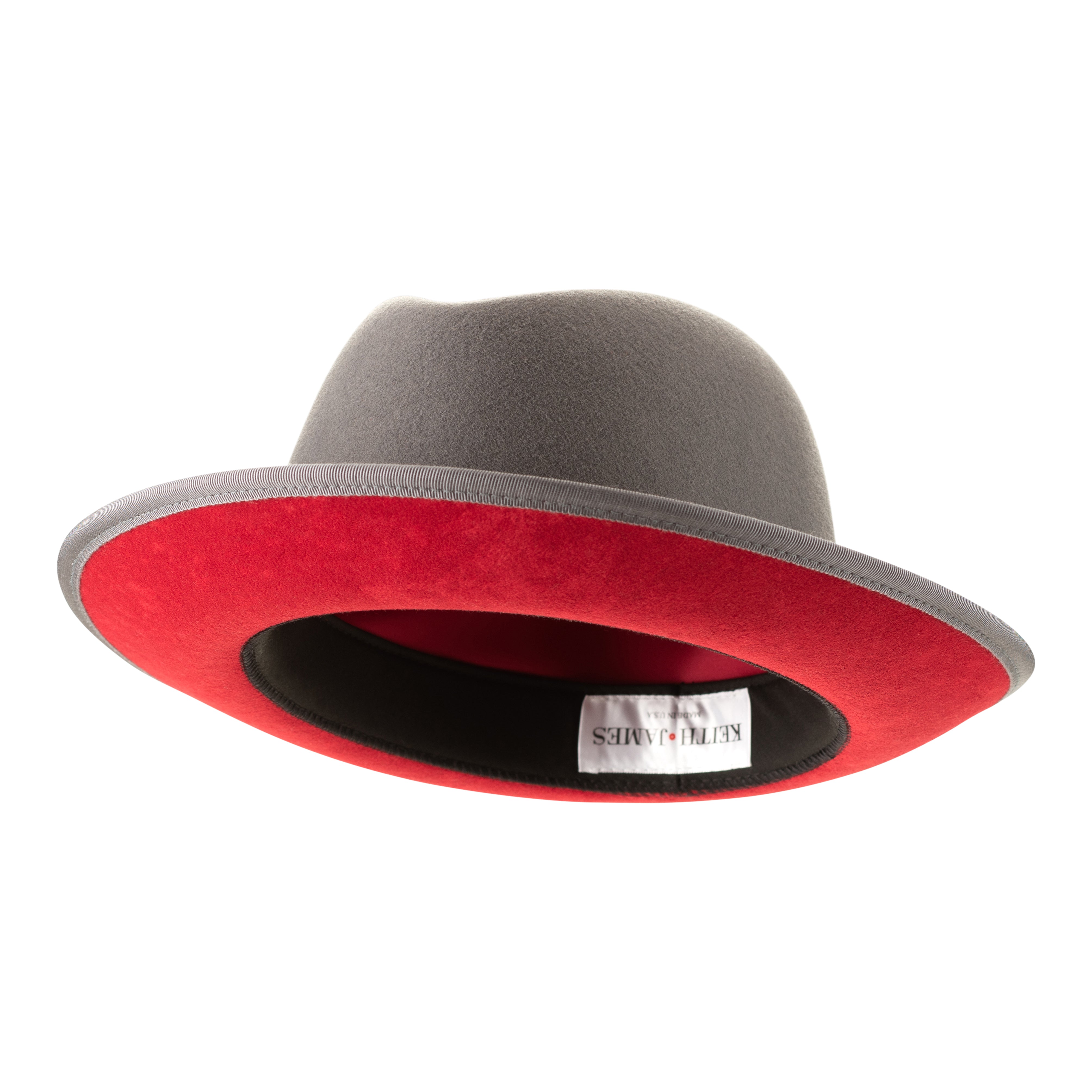 A classic center-creased fedora with a 2.5 inch curved brim featuring a bound edge, signature logo pin, red bottom brim, and a gray ribbon trim.