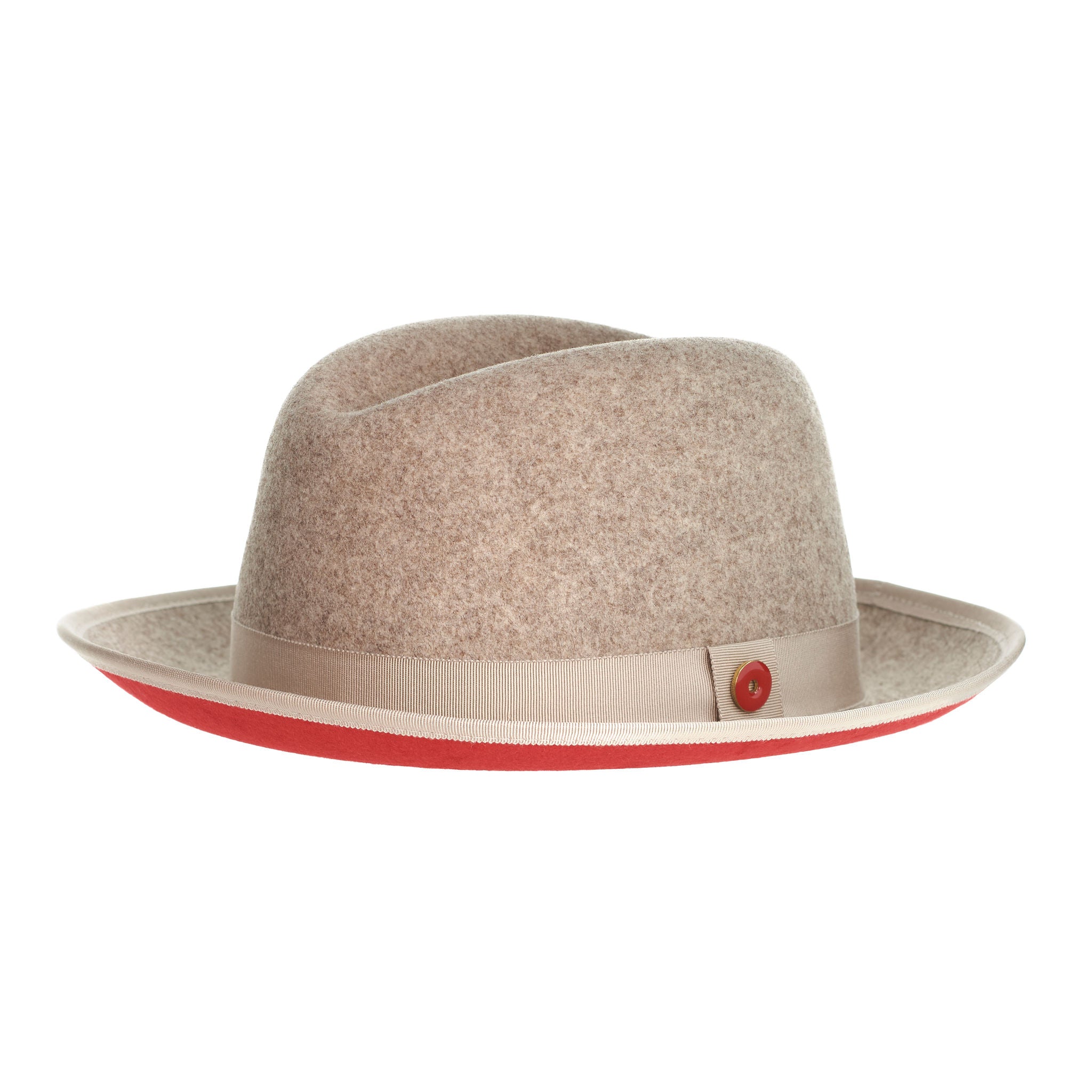 A beige fedora hat with a red bottom brim and a signature logo pin.