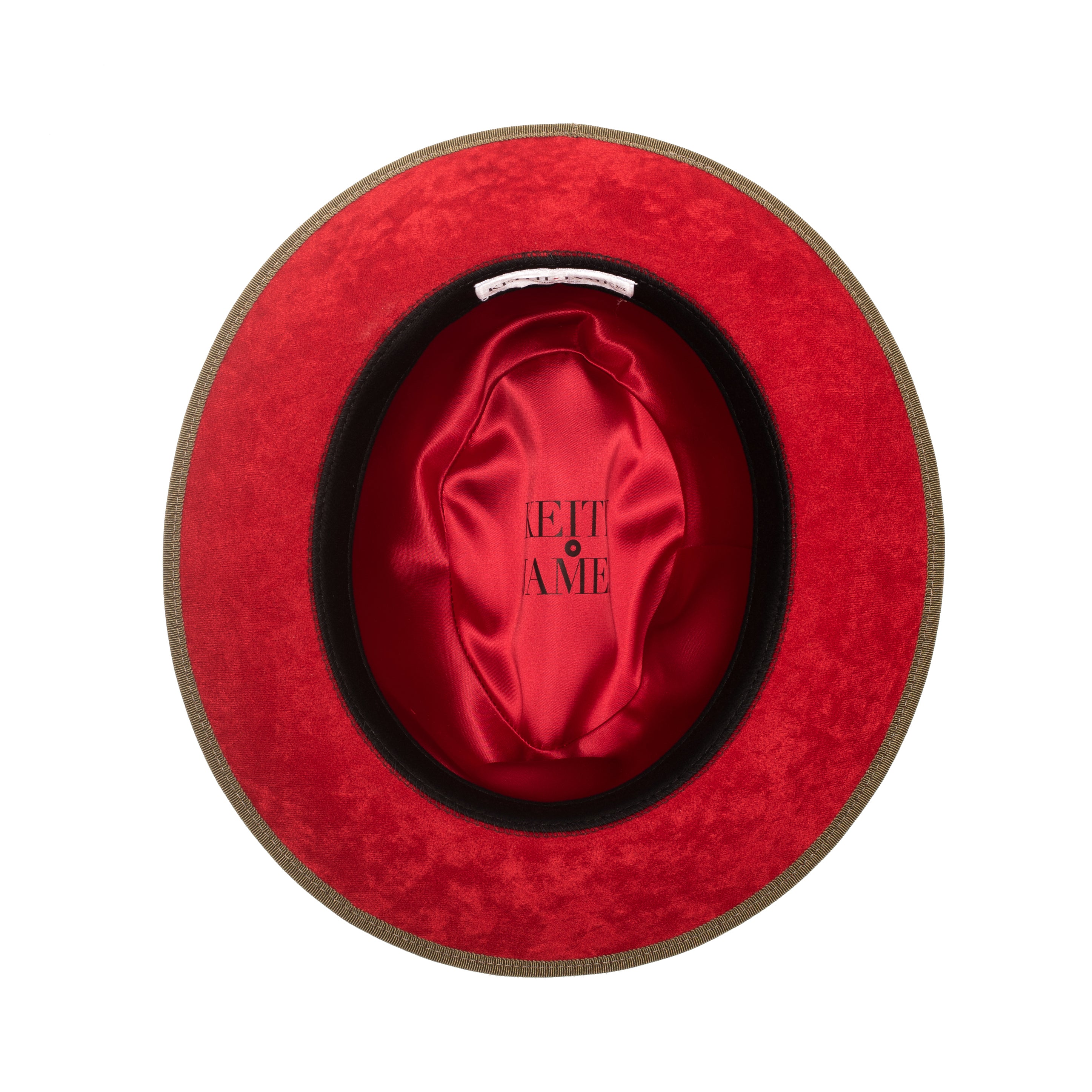 An olive green classic center-creased fedora with a red bottom brim and a signature logo pin on the side.