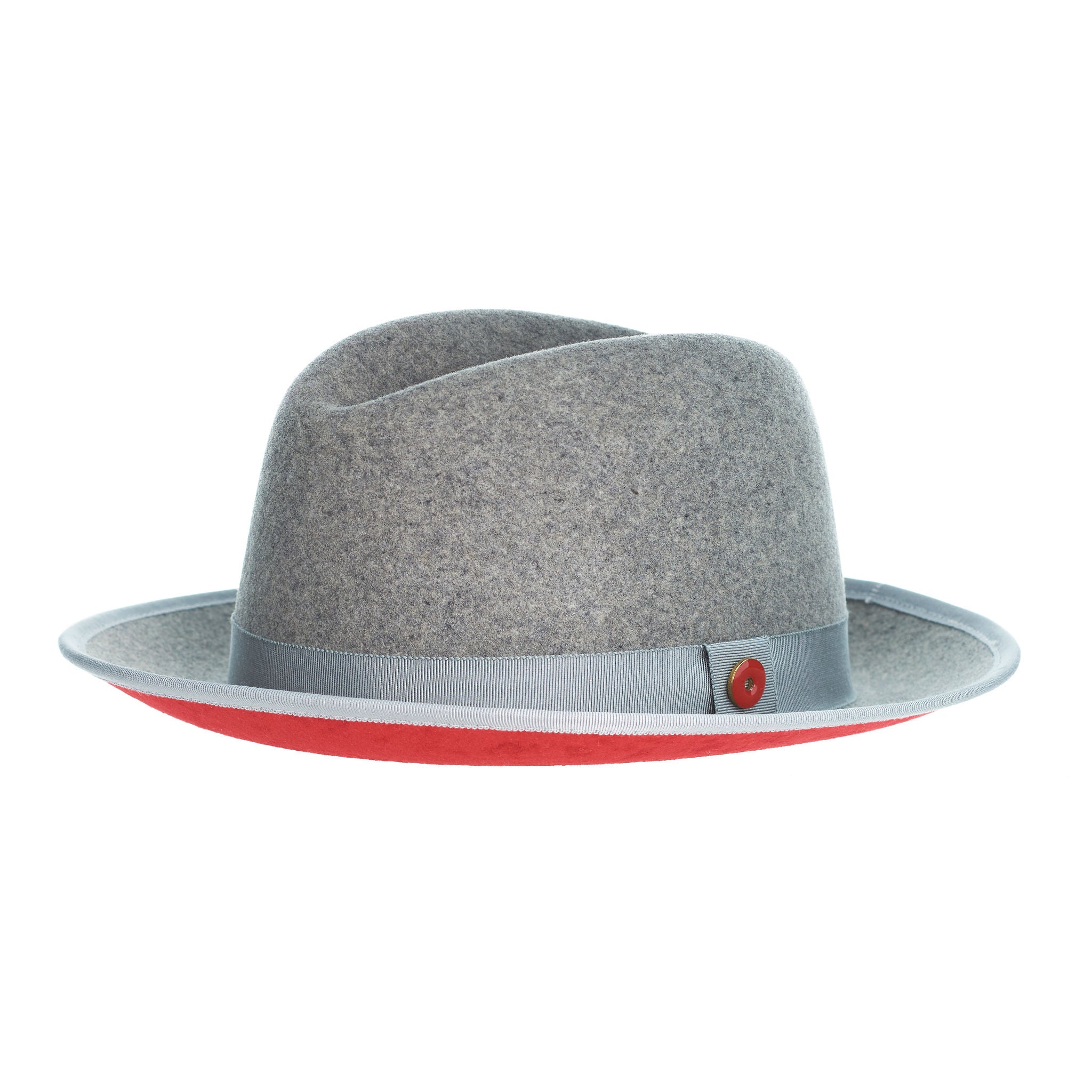 A gray fedora hat with a red bottom brim and a signature logo pin.
