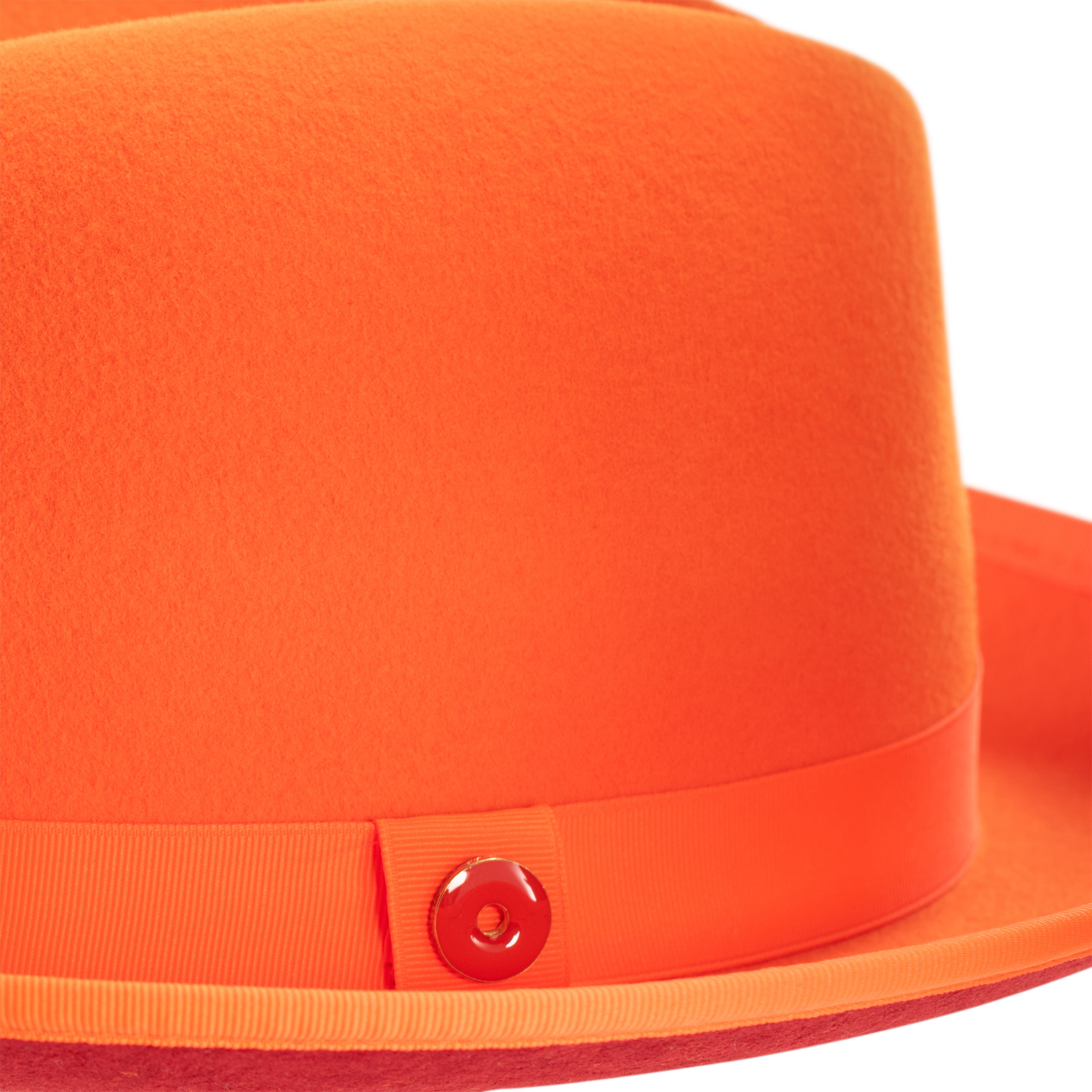 A tiger orange classic center-creased fedora with a 2.5 inch curved brim and a red bottom brim.