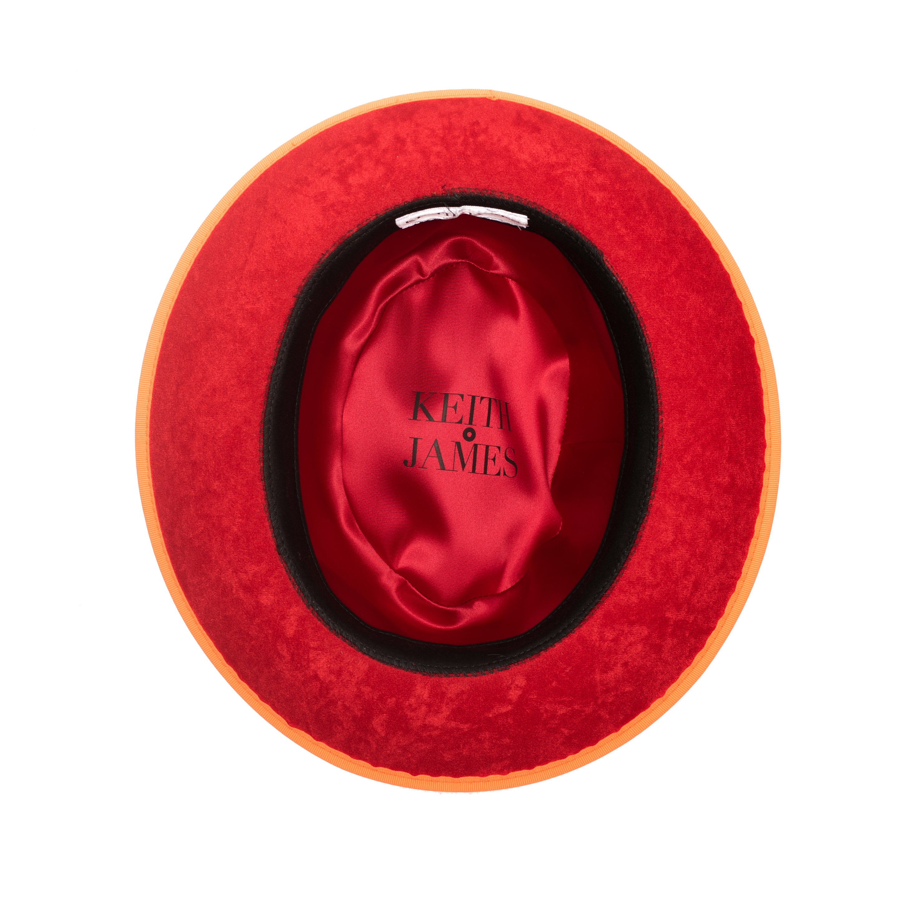 A tiger orange classic center-creased fedora with a 2.5 inch curved brim and a red bottom brim.