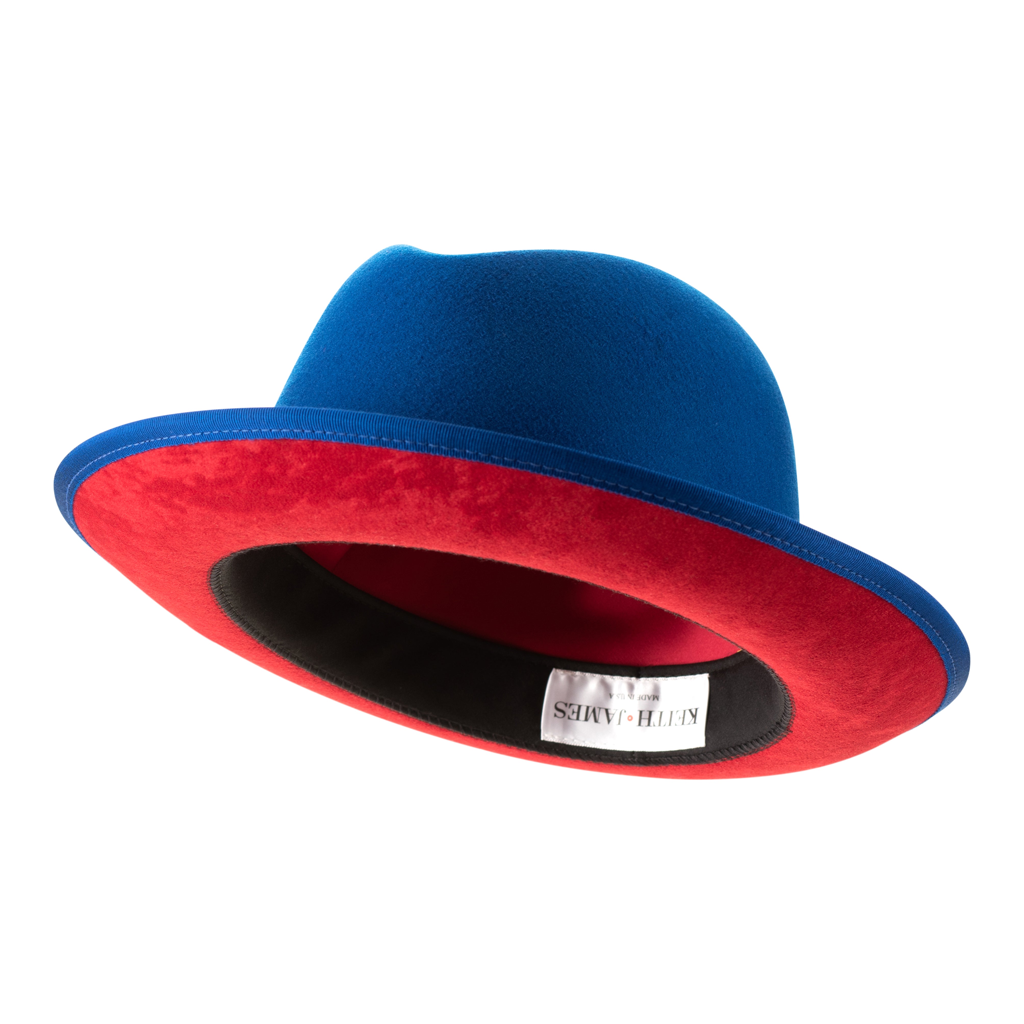 A blue fedora hat with a red bottom brim and a signature logo pin.