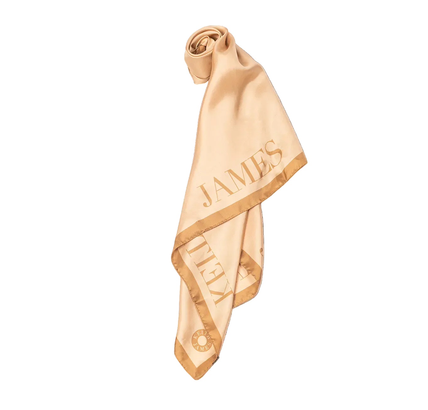 A rolled-up silk scarf with cream and tan colors, featuring text that appears to be a name and the brand 'Keith James'.