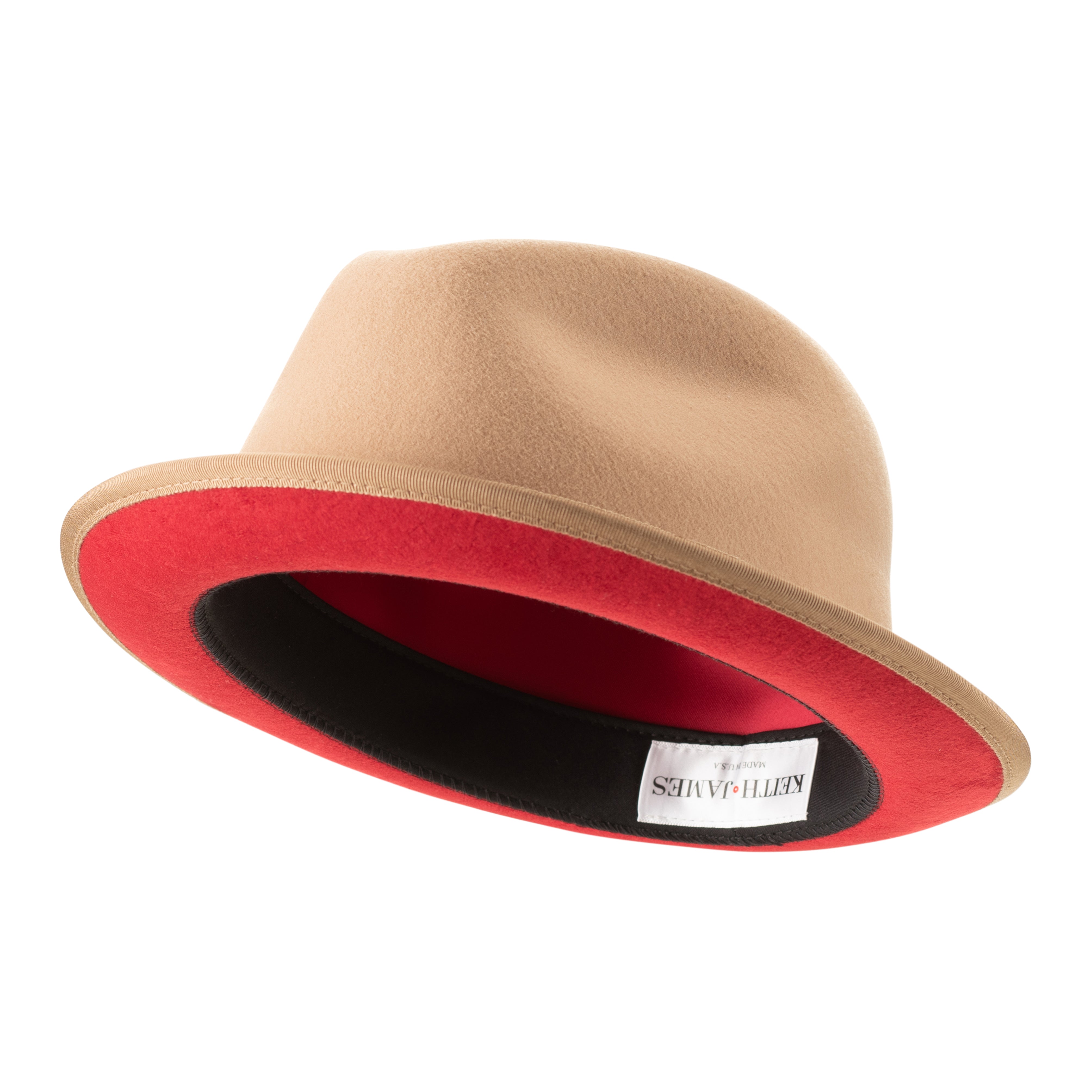 A golden honey colored fedora hat with a pinched crown, a 2-inch brim, and a red bottom brim. It includes a classic ribbon and bow with a signature logo pin.