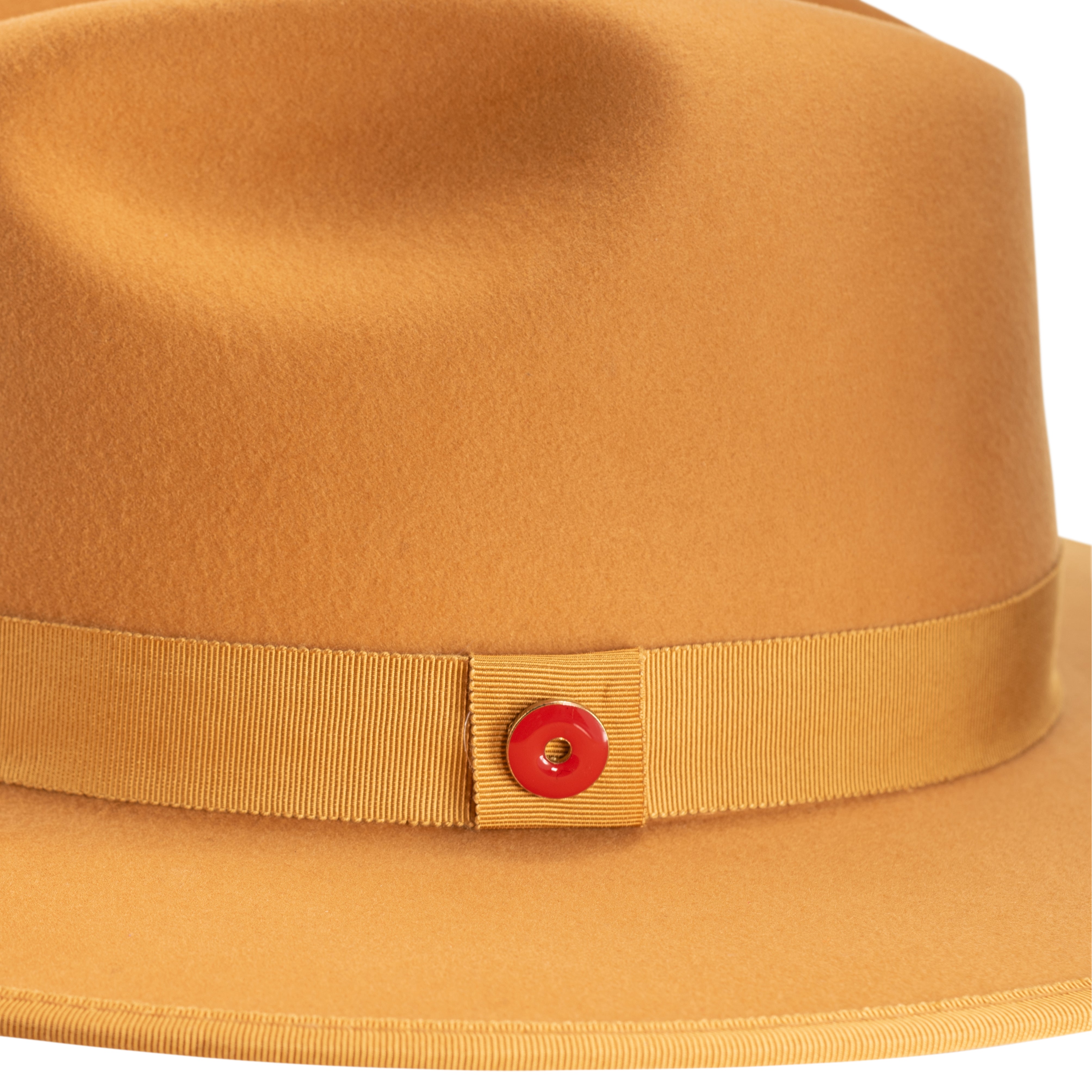 A canary yellow fedora hat with a flat brim, pinched crown, and a classic ribbon trim including a signature logo pin on the side.