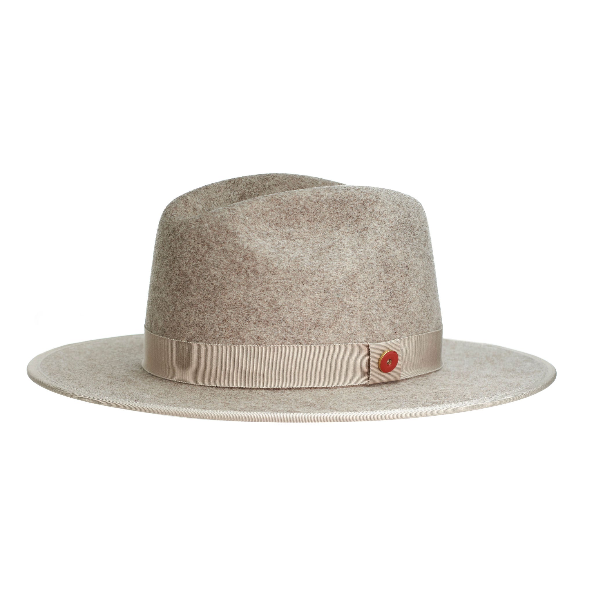 A beige pinched crown fedora hat with a flat brim and a classic ribbon trim, featuring a signature logo pin and a red bottom brim.