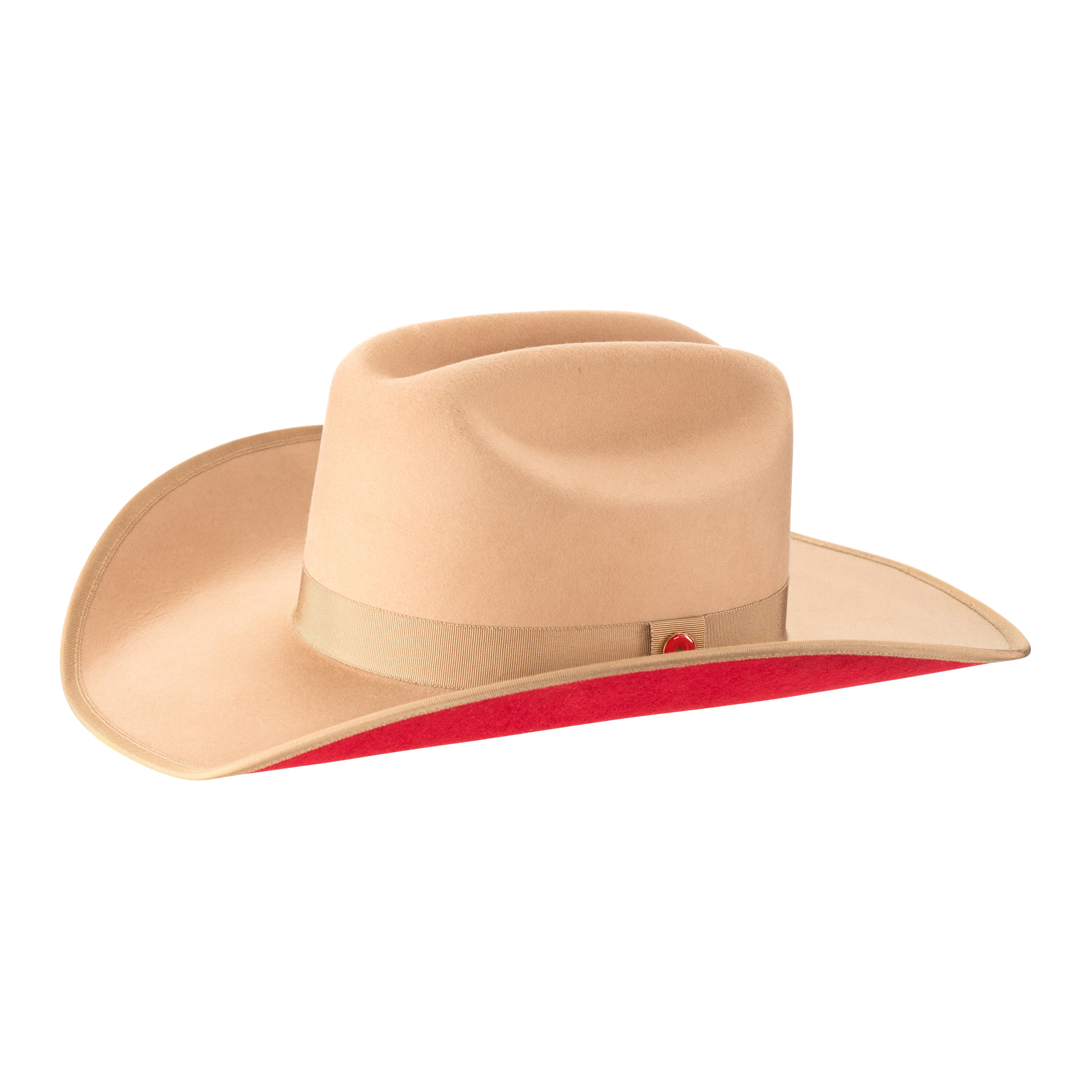 A golden honey colored cowboy hat with a red suede under brim and a hat pin.