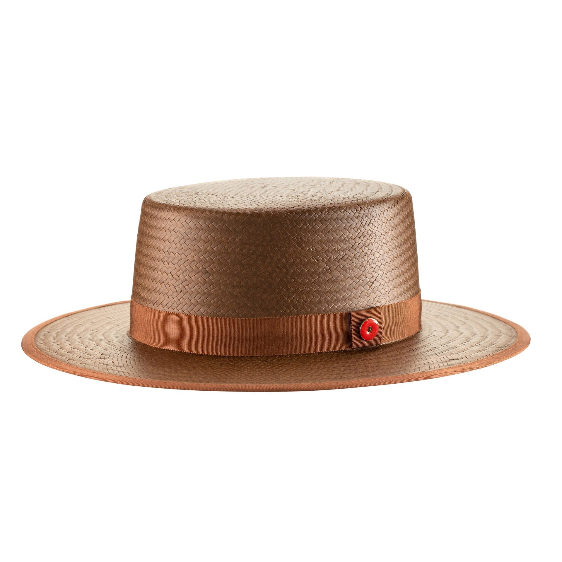 Brown straw hat with a leather band and red button on a white background