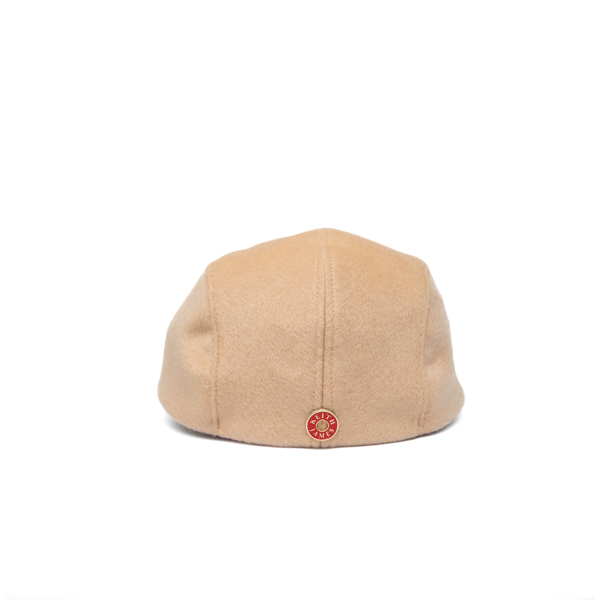A beige Newsboy cap made of Australian wool with a cotton twill visor, featuring a satin padded sweatband and a signature logo pin.