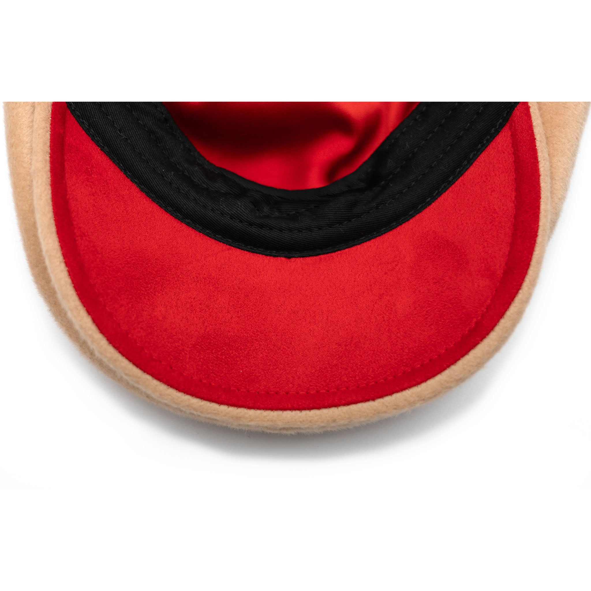 A beige Newsboy cap made of Australian wool with a cotton twill visor, featuring a satin padded sweatband and a signature logo pin.