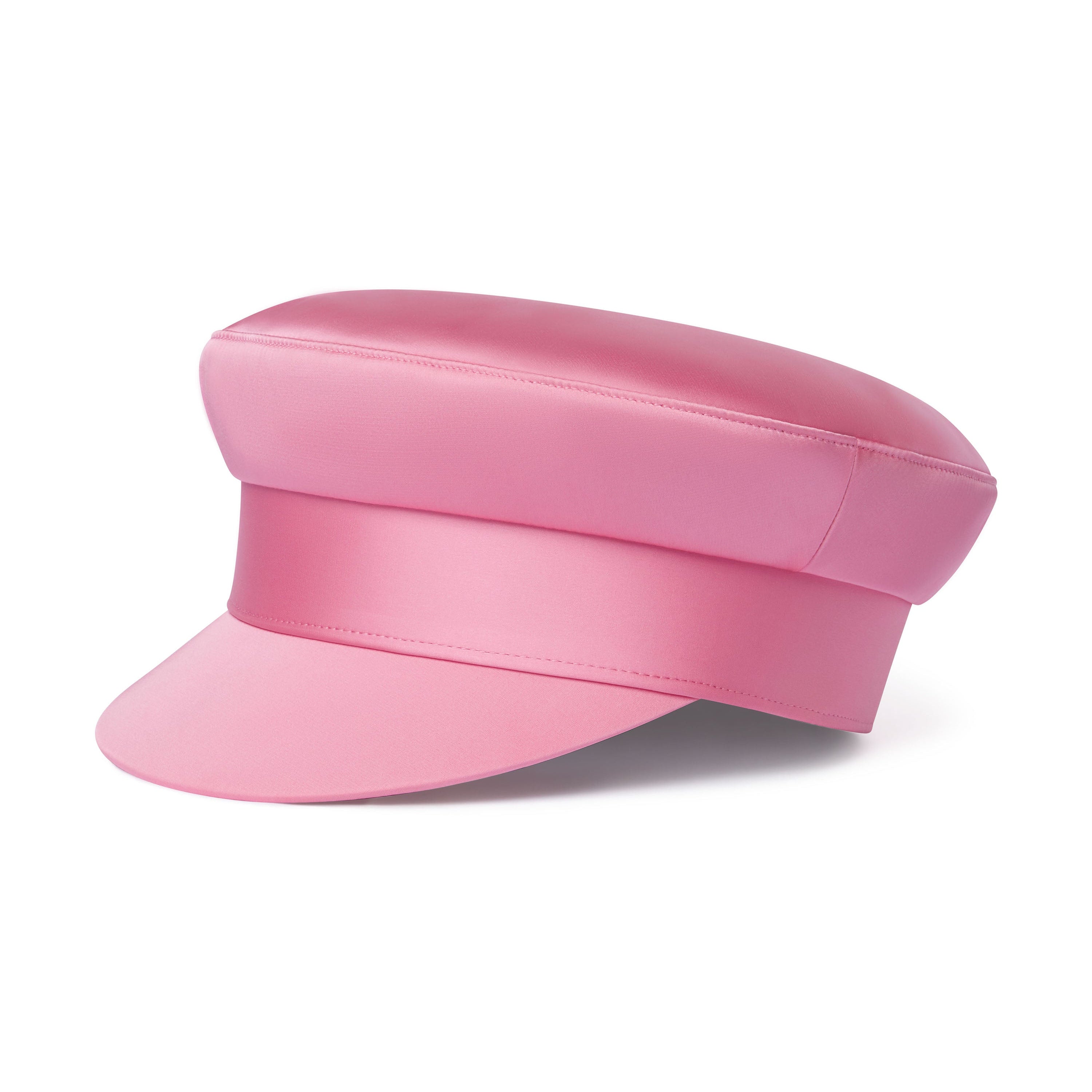 A soft pink structured sailor cap with a curved visor, featuring a signature detail on the front and a branded sweatband.