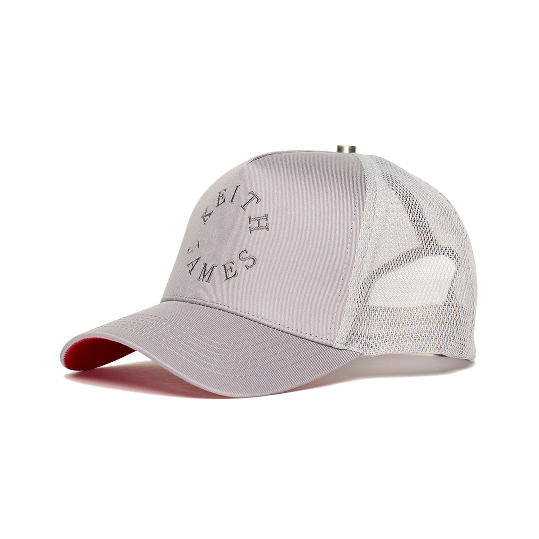 A trucker hat with a Keith James Logo