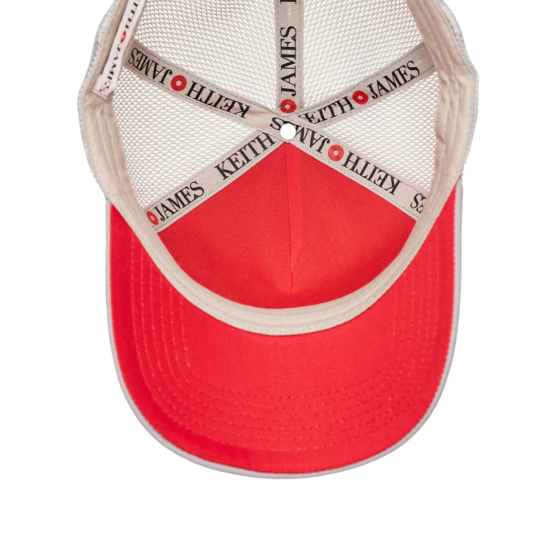 A trucker hat with a Keith James Logo