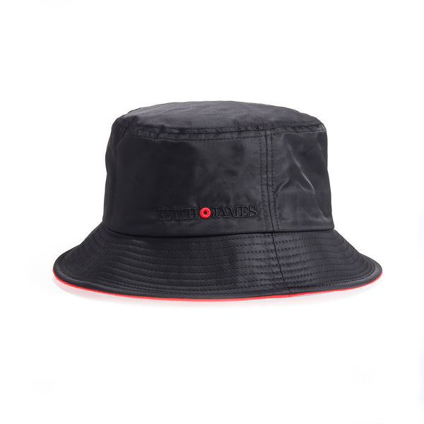 A jet black bucket hat with a red detail around the base.