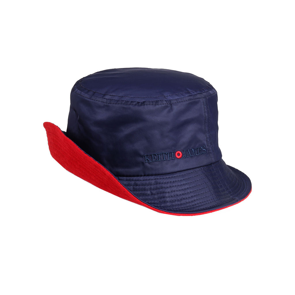 A navy blue bucket hat with a red detail around the base and the brand name 'Keith James' visible on the front.