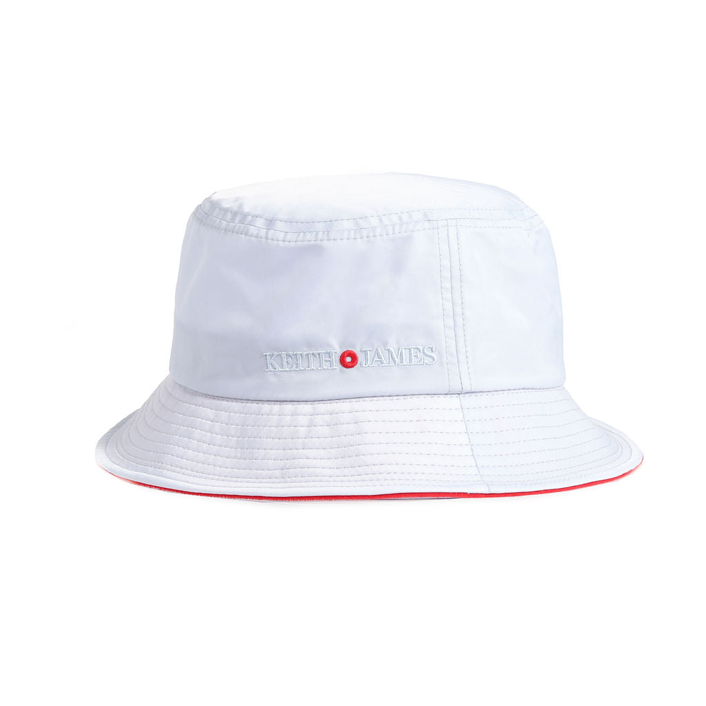 A silver blue bucket hat with a red inner brim, featuring a brand logo on the front.