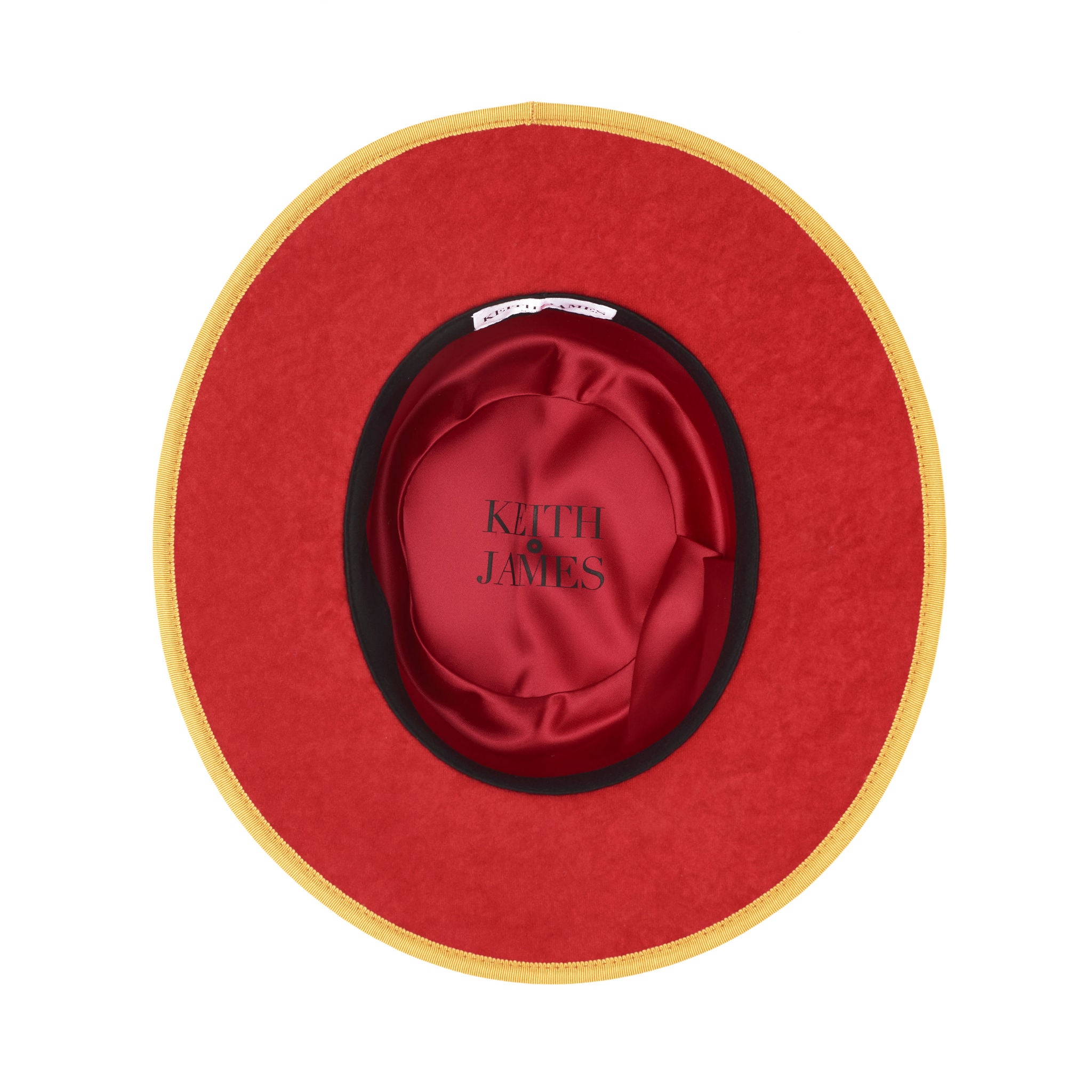 Beige straw hat with a brown band on a white background