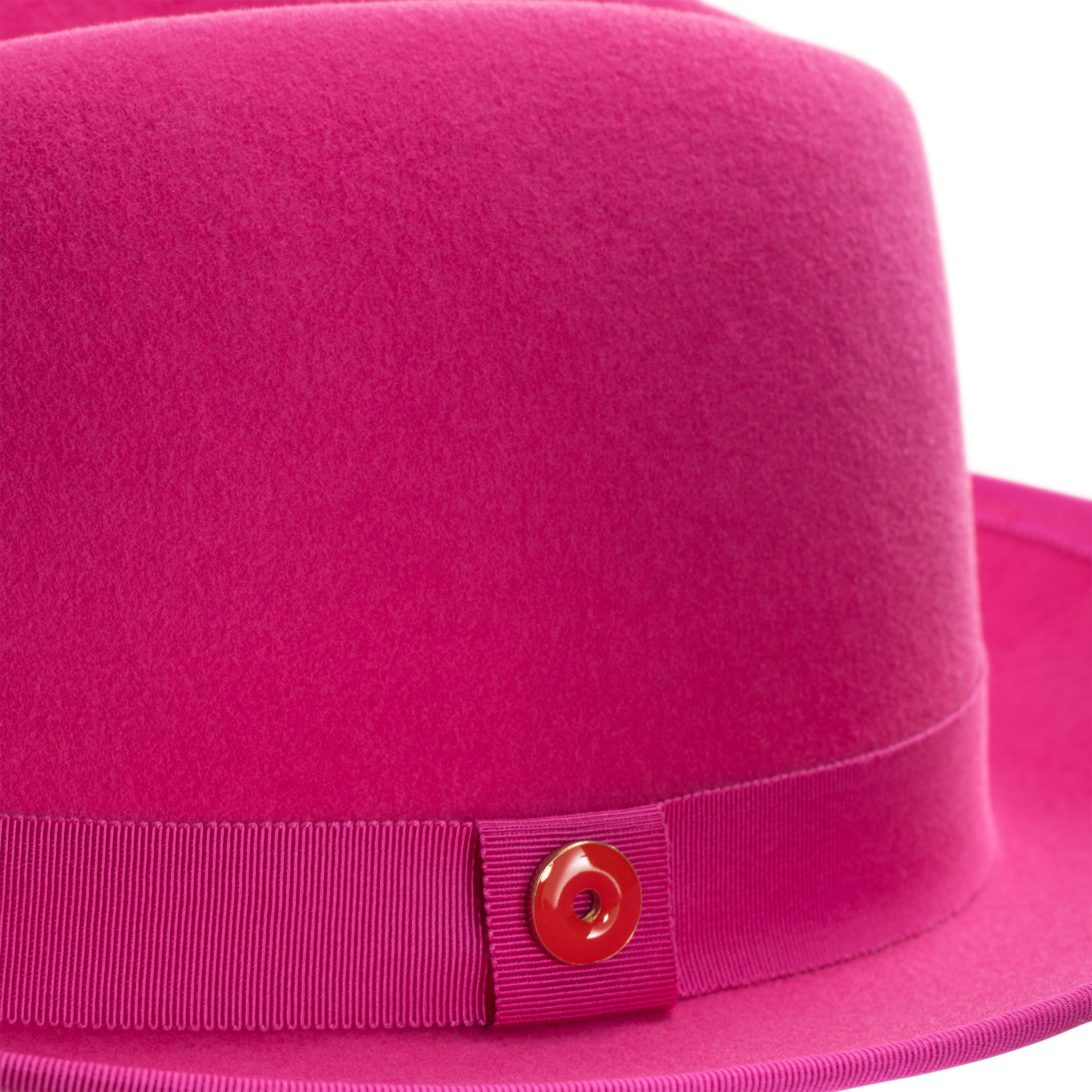 A hot pink classic center-creased fedora with a 2.5 inch curved brim and a signature logo pin on the side.