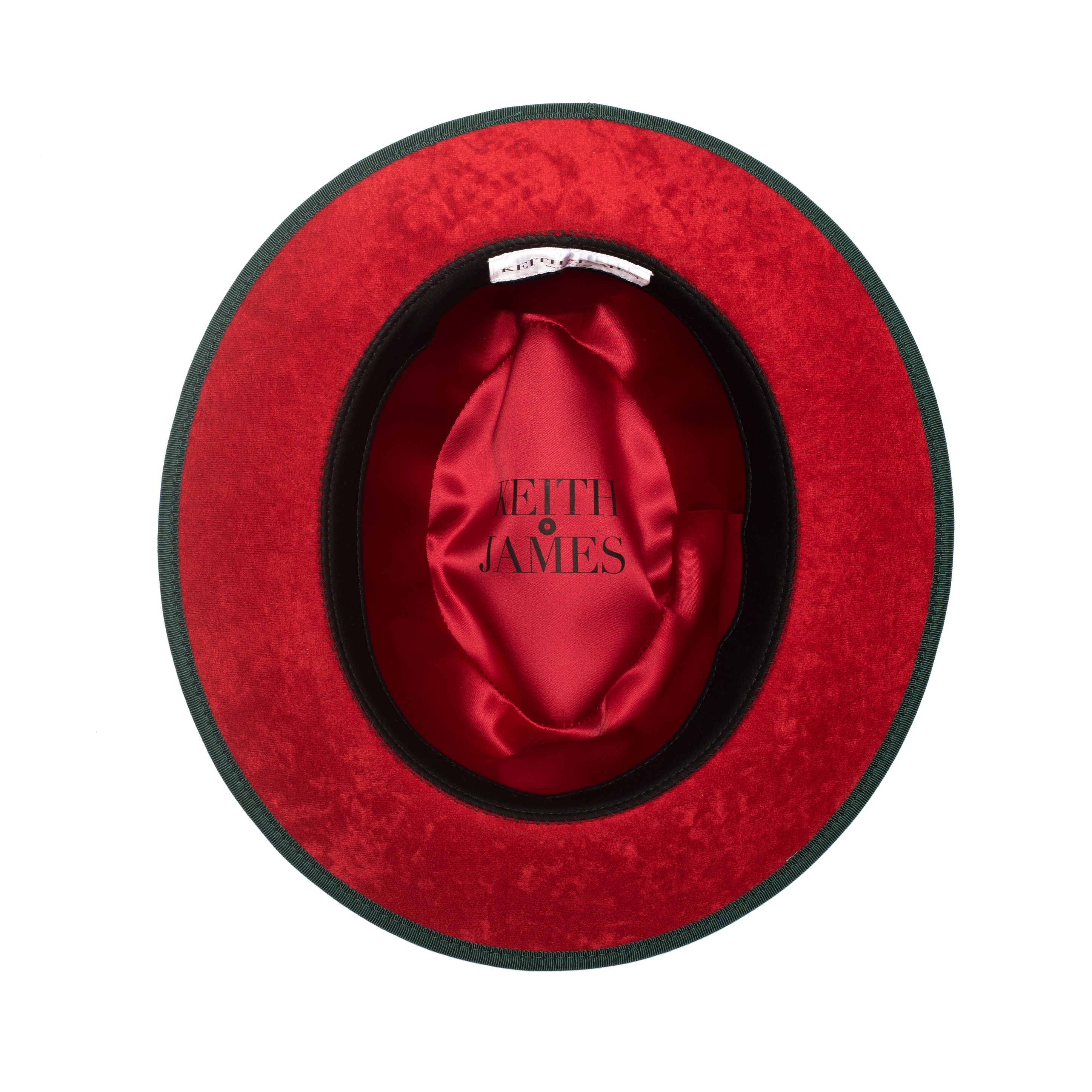 A green classic center-creased fedora with a 2.5 inch curved brim, signature logo pin, and red bottom brim.