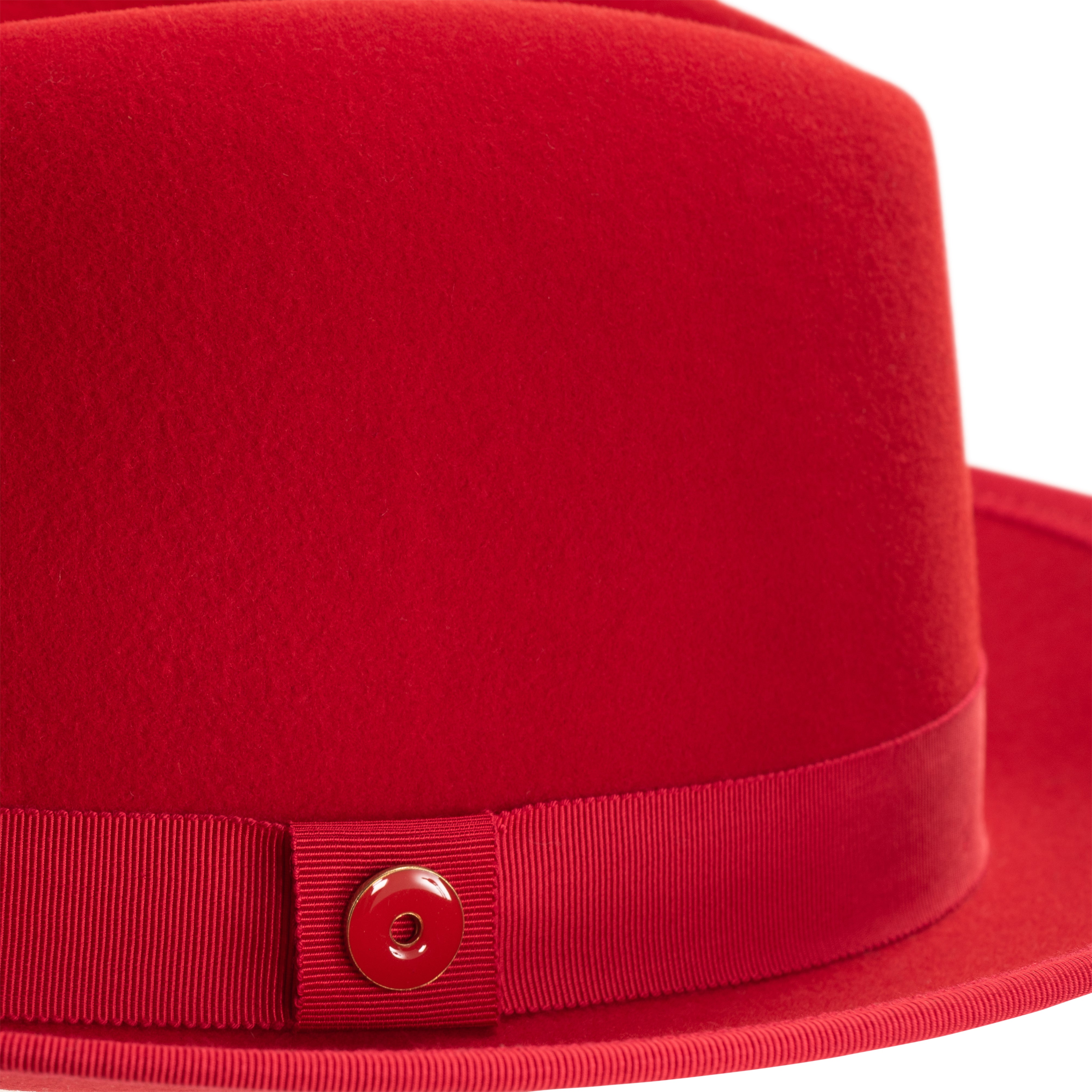A rose red classic center-creased fedora with a 3 inch curved brim and bound edge, featuring a signature logo pin and red bottom brim.