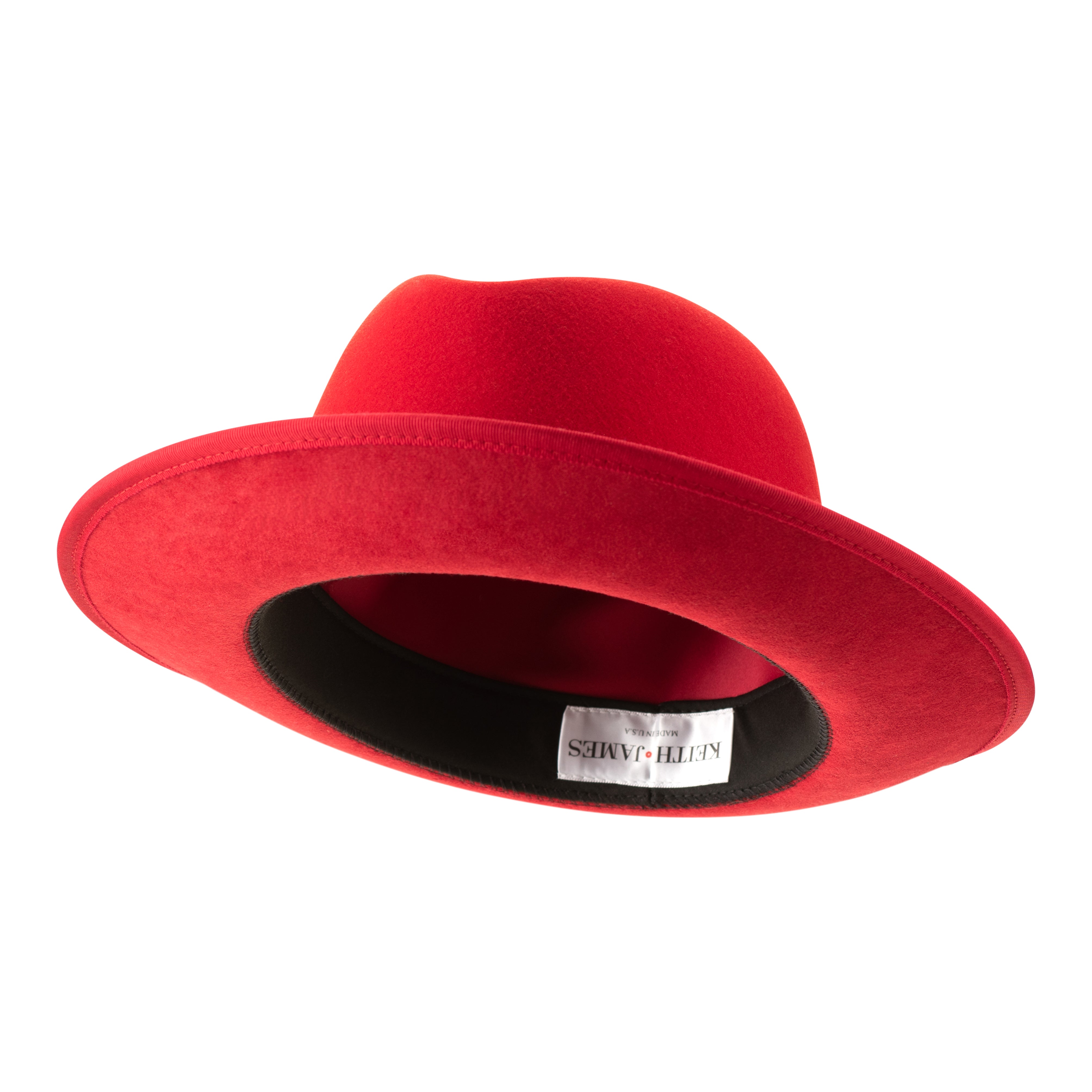A rose red classic center-creased fedora with a 3 inch curved brim and bound edge, featuring a signature logo pin and red bottom brim.