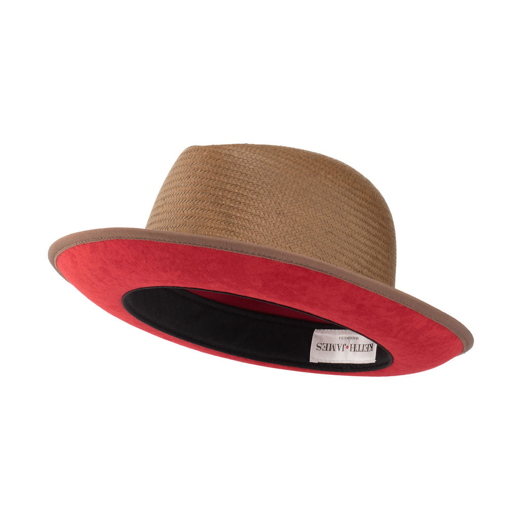 A cocoa brown classic center-creased fedora with a 2.5 inch curved brim, ribbon trim, and a red bottom brim.