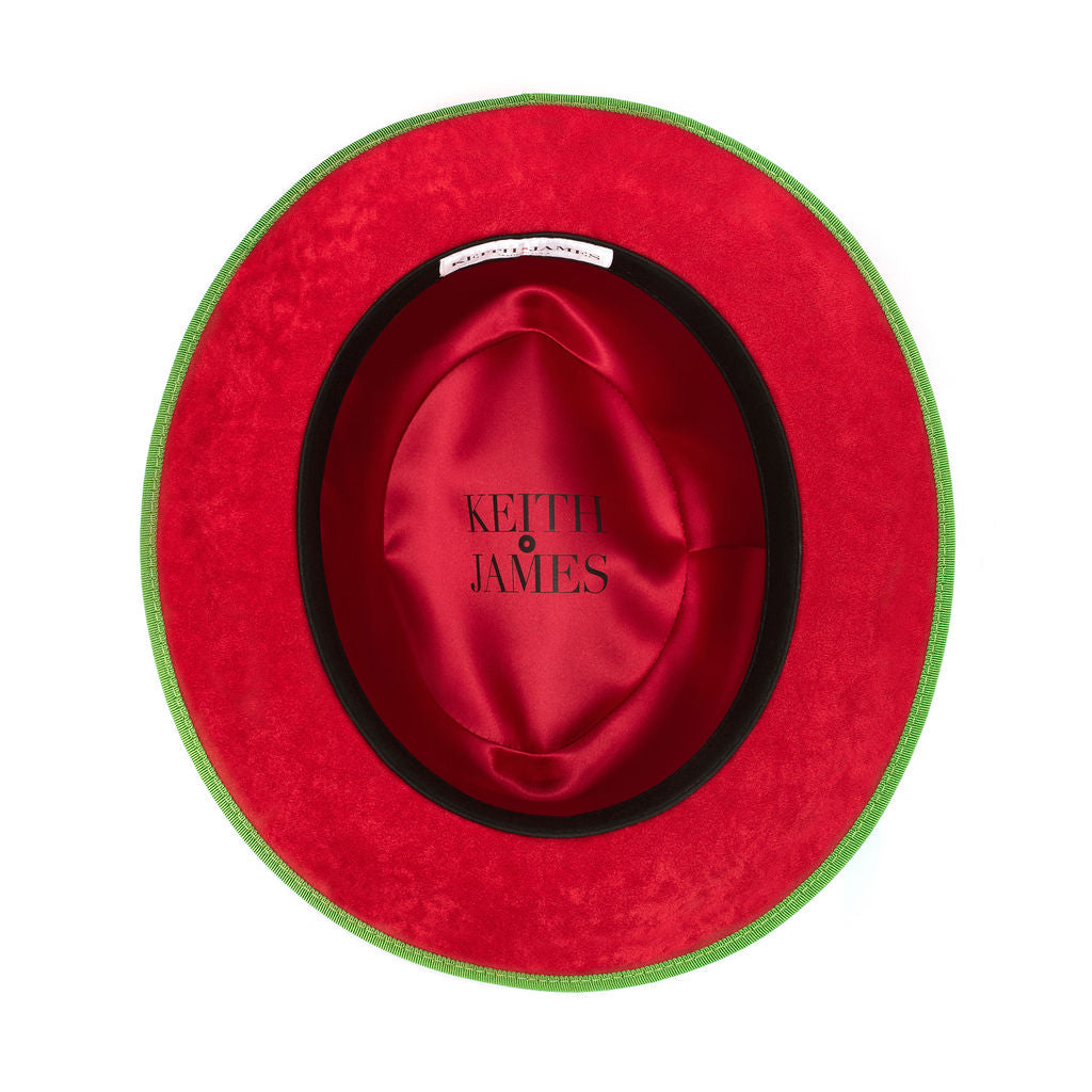 A lime green straw fedora with a red bottom brim and a ribbon trim around the base.