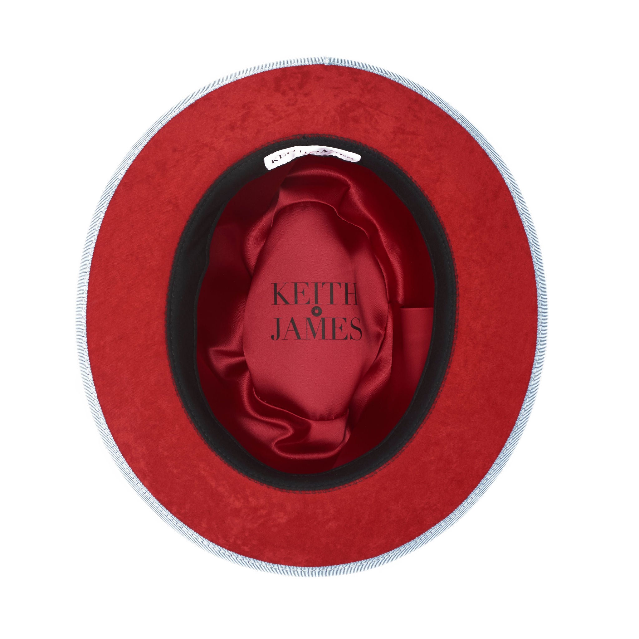 A blue fedora with a red bottom brim and a signature logo pin.