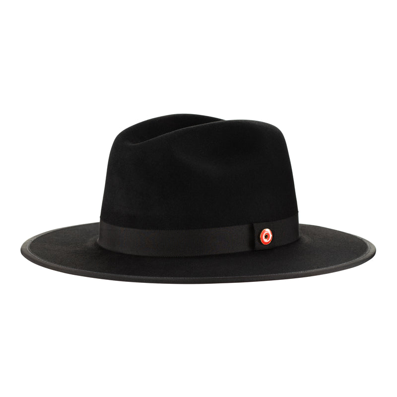 A jet black fedora hat with a pinched crown, flat brim, and bound edge. It includes a classic ribbon trim, a signature logo pin, and a red bottom brim.