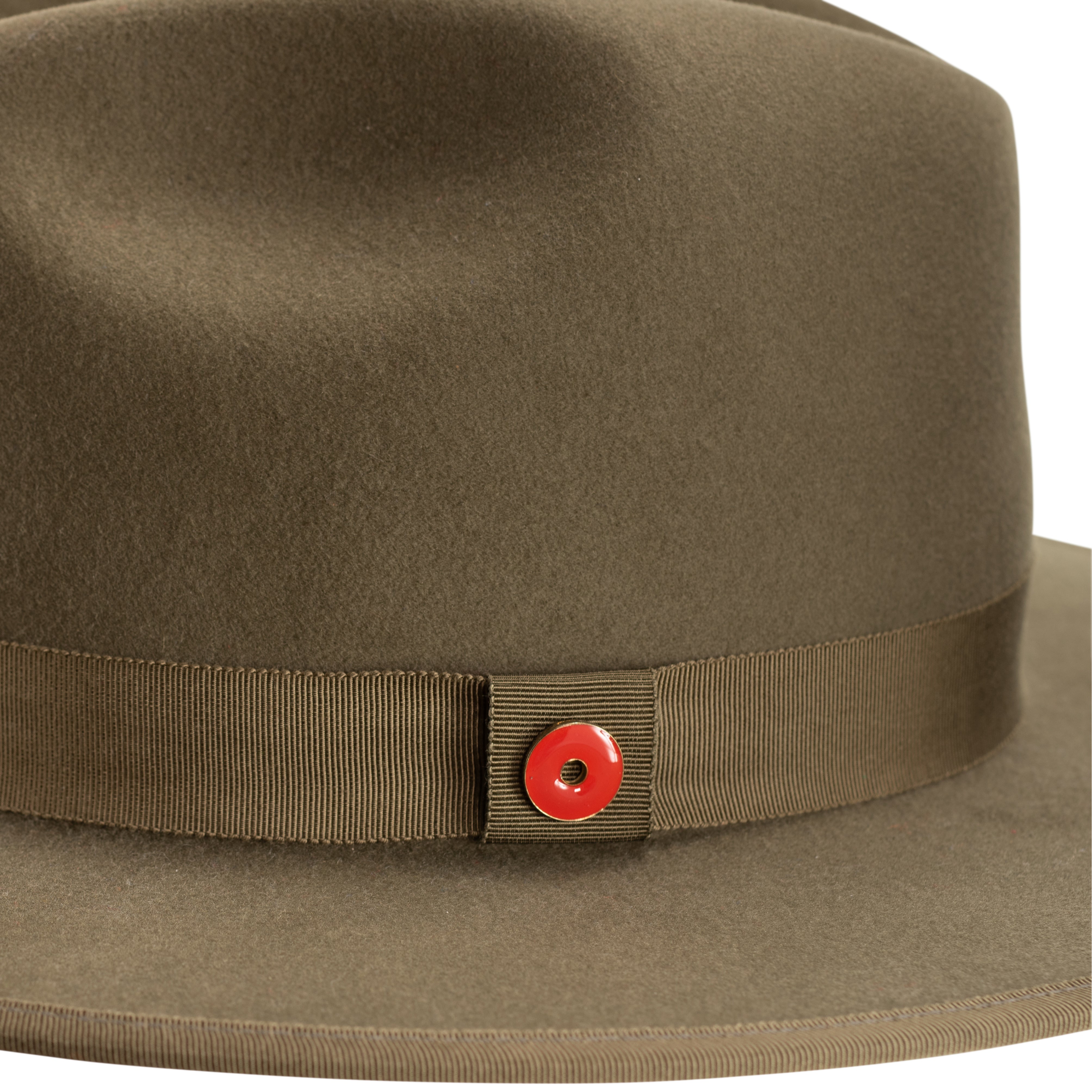 An olive green fedora hat with a flat brim and a classic ribbon trim, featuring a signature logo pin and a red bottom brim.