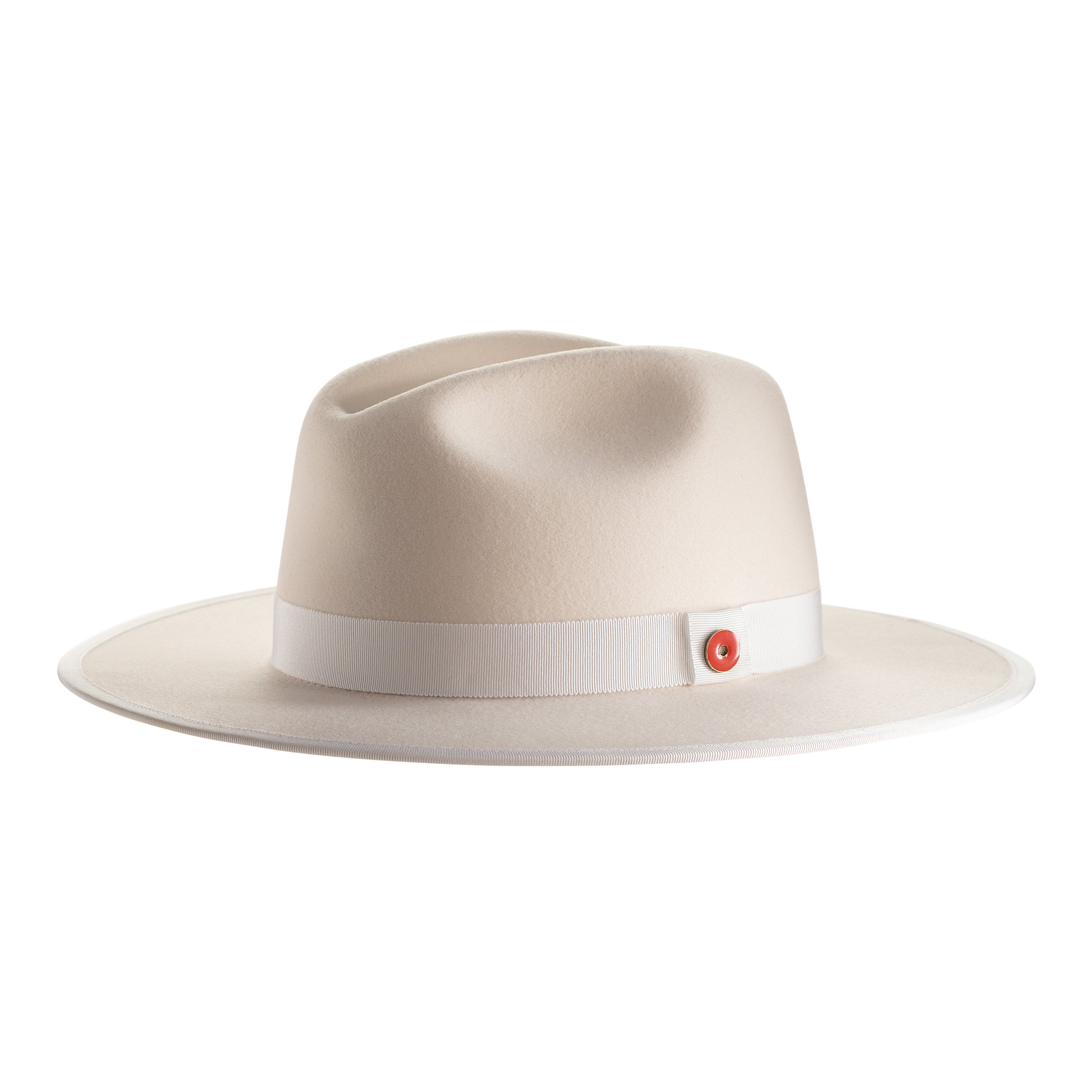 A snow white fedora hat with a pinched crown, flat brim, and bound edge. It includes a classic ribbon trim, a signature logo pin, and a red bottom brim.