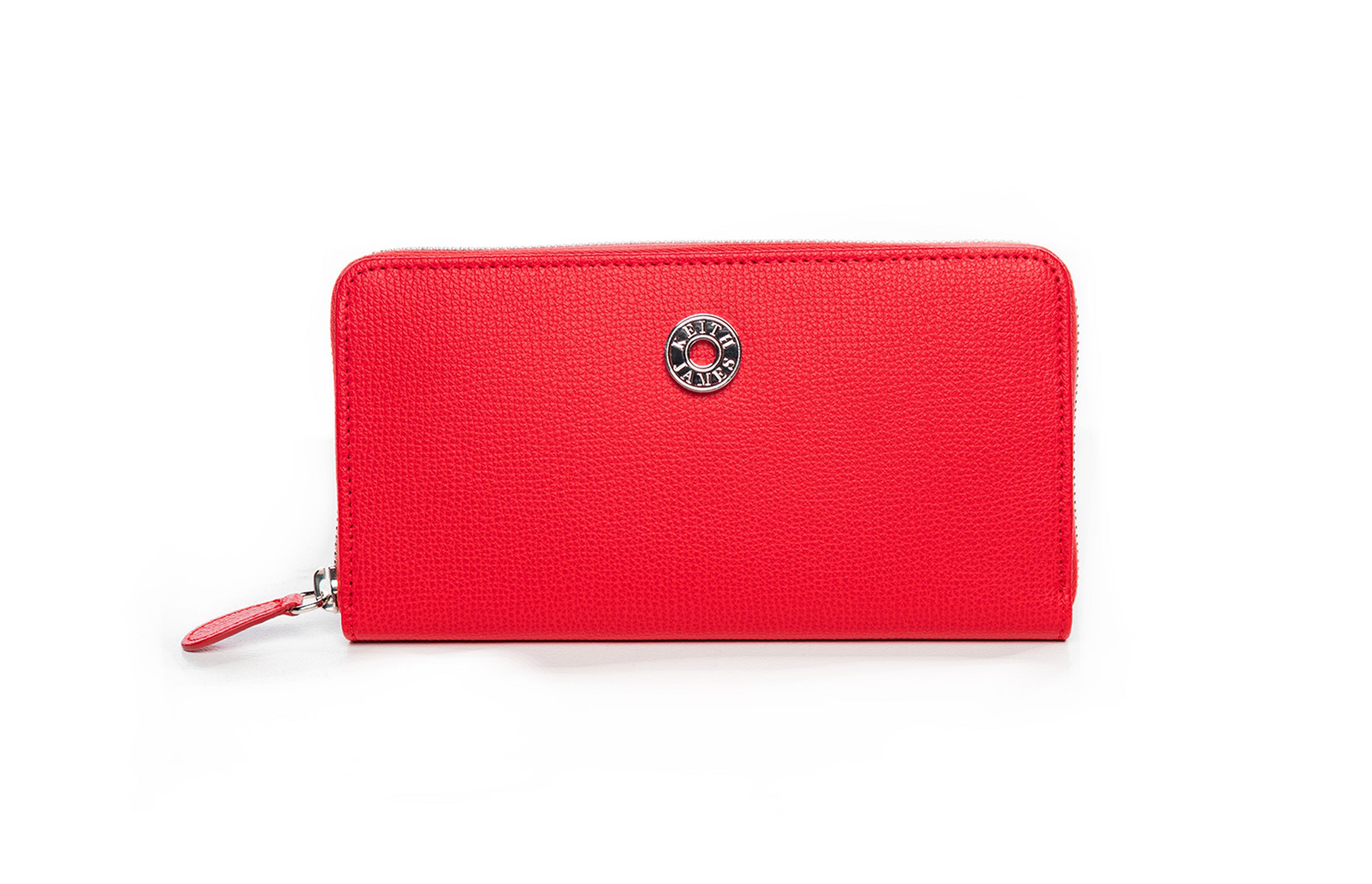 A rose red colored wallet with a zipper closure and a logo emblem on the front.